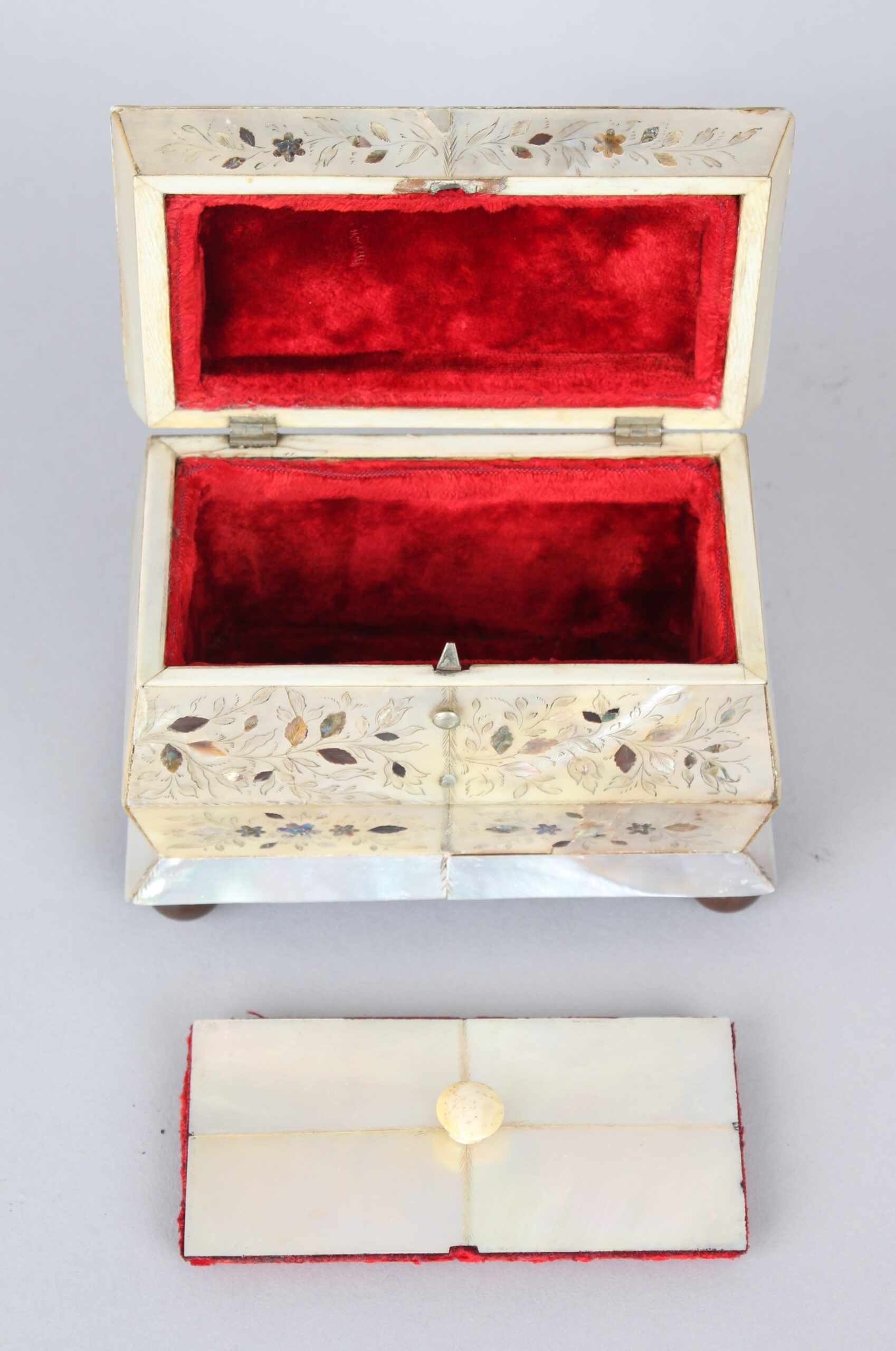An unusually small early Victorian mother of pearl tea caddy