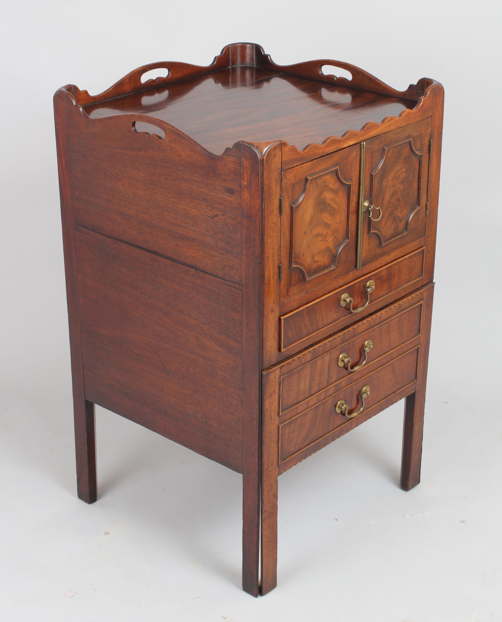 A George III period mahogany tray top bedside commode