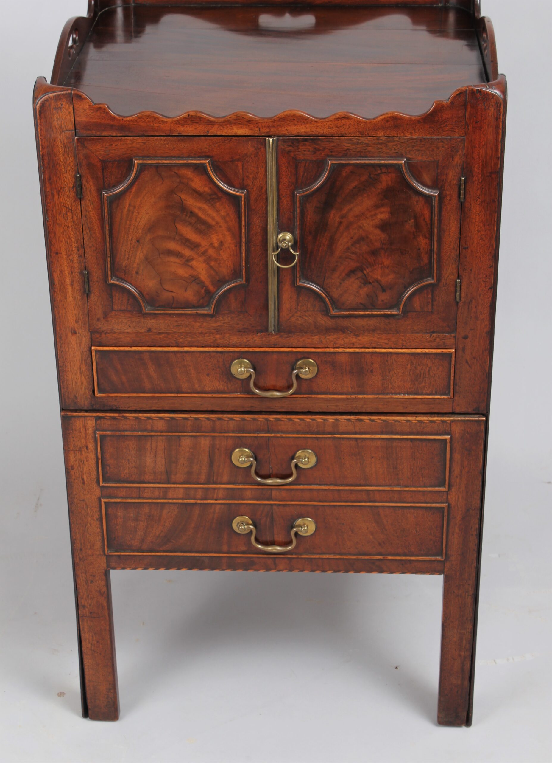A George III period mahogany tray top bedside commode