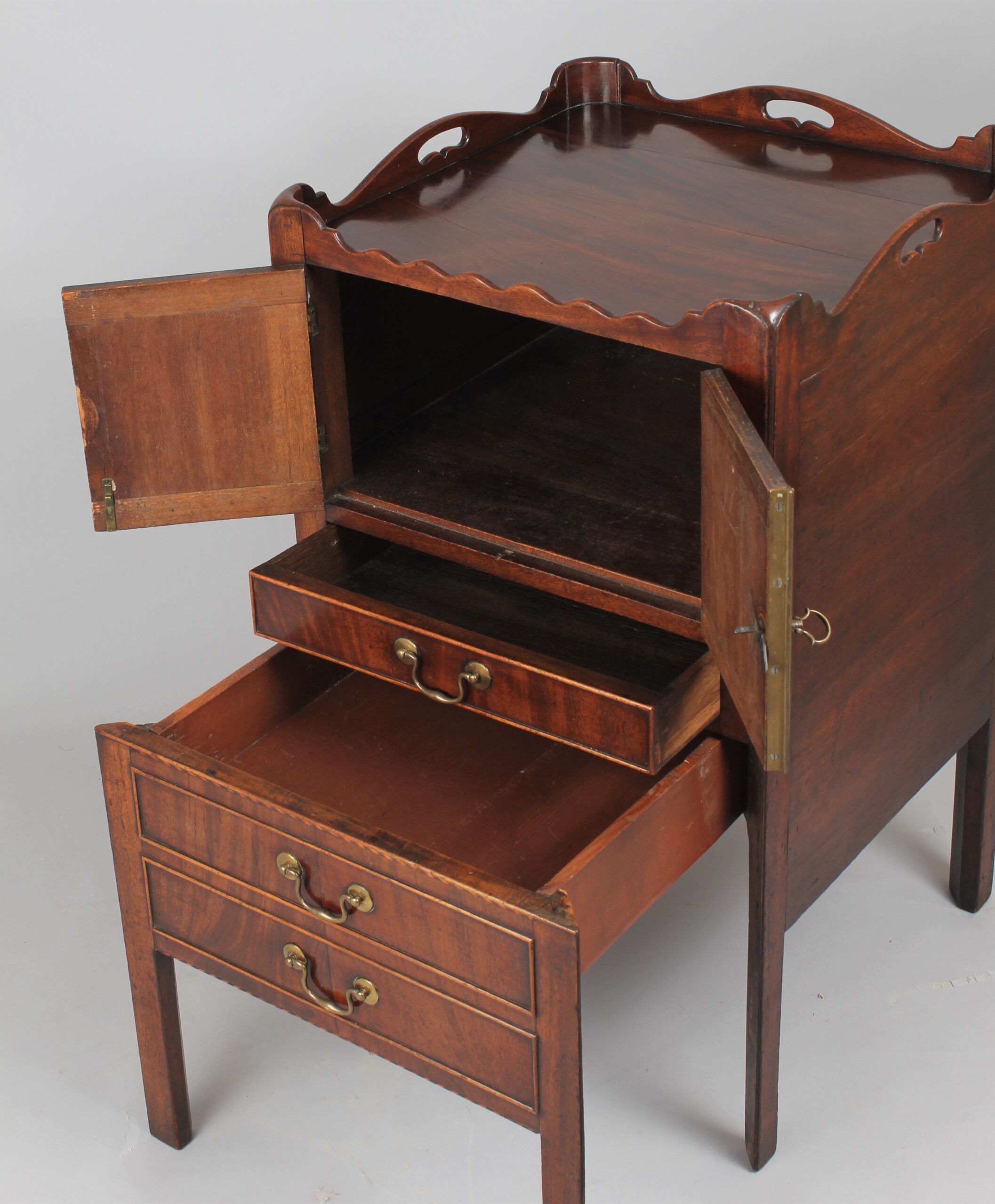 A George III period mahogany tray top bedside commode