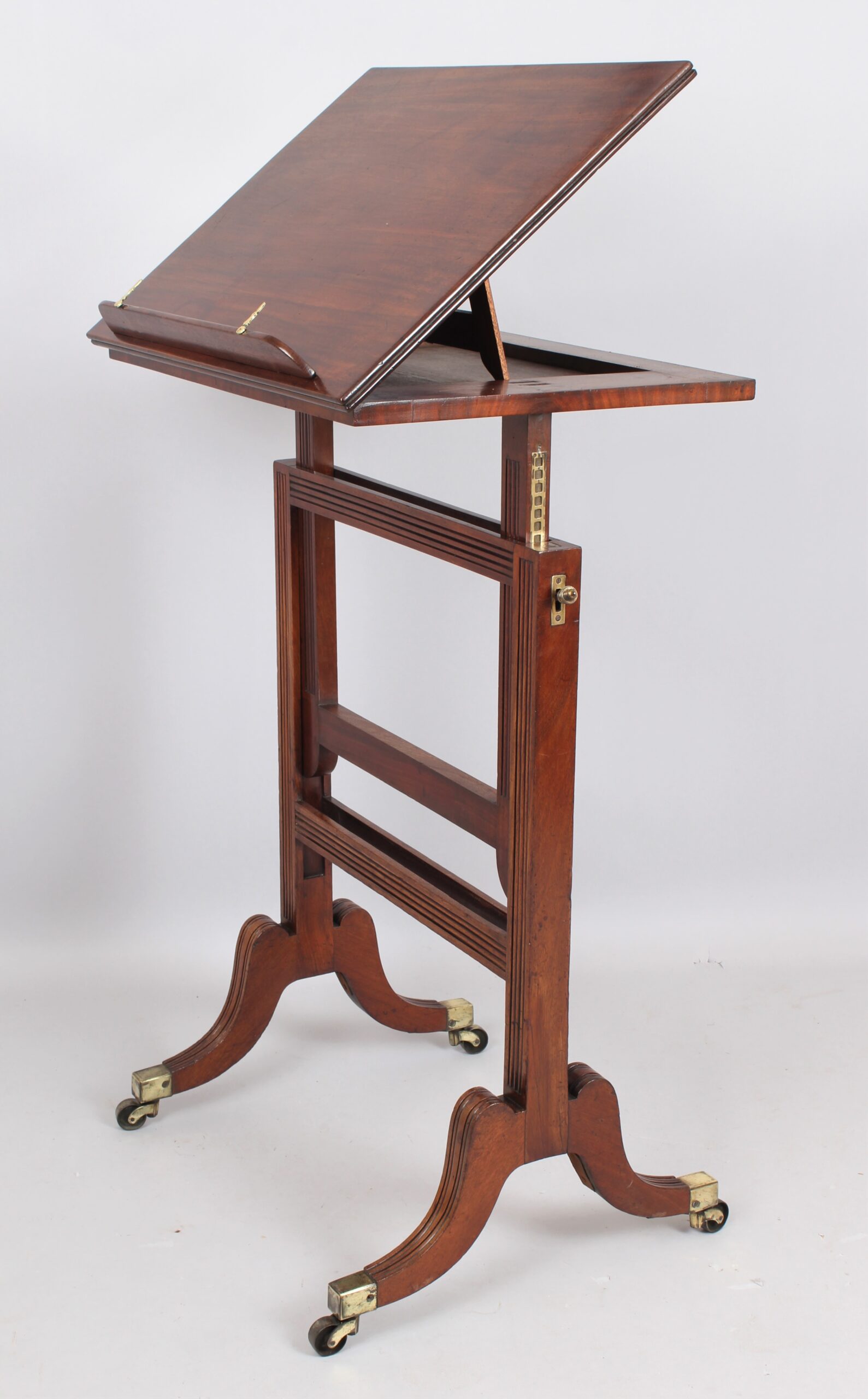 A Regency mahogany adjustable reading table