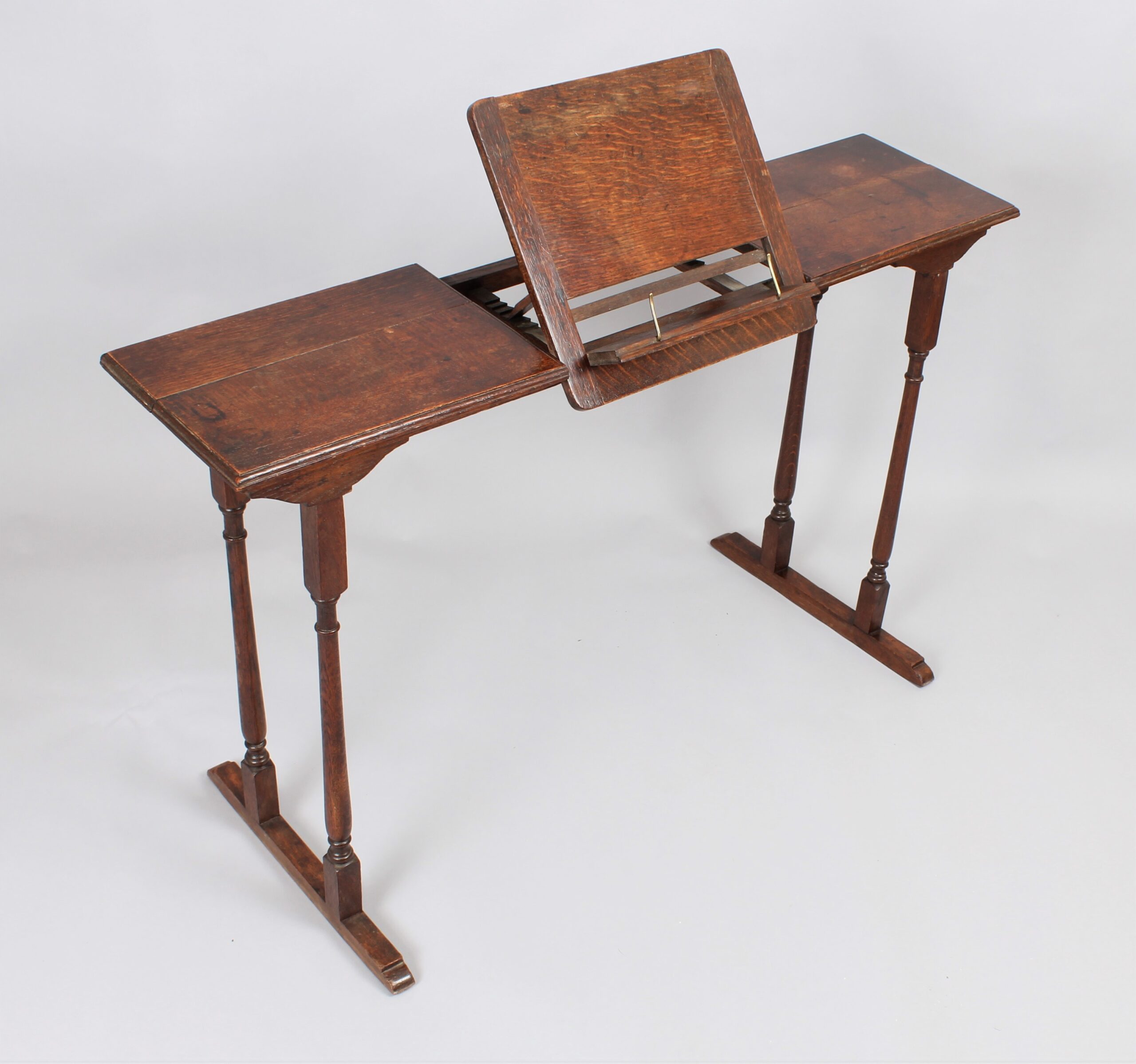 Late 19th early 20th oak reading, artist’s or musician’s table