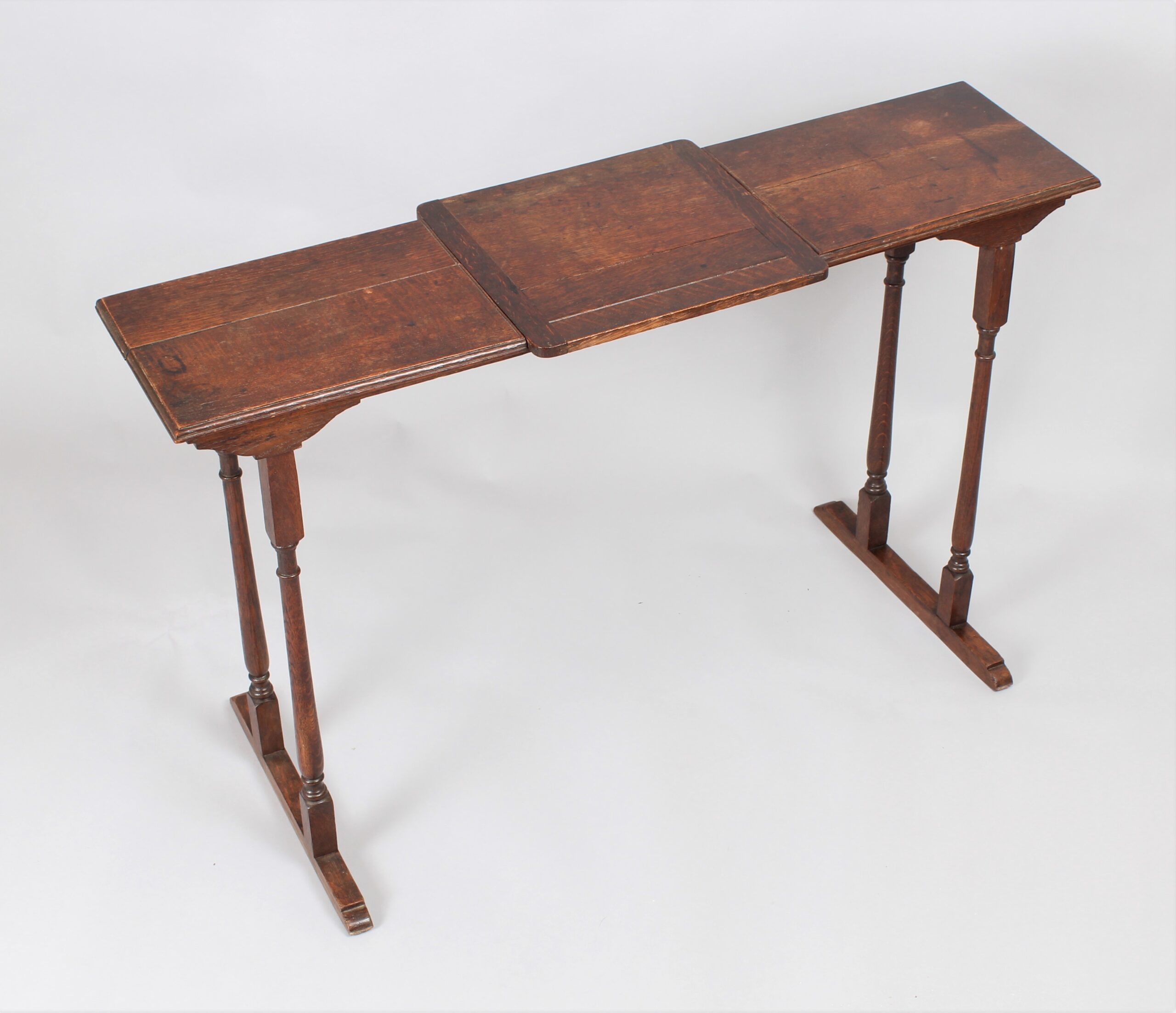 Late 19th early 20th oak reading, artist’s or musician’s table