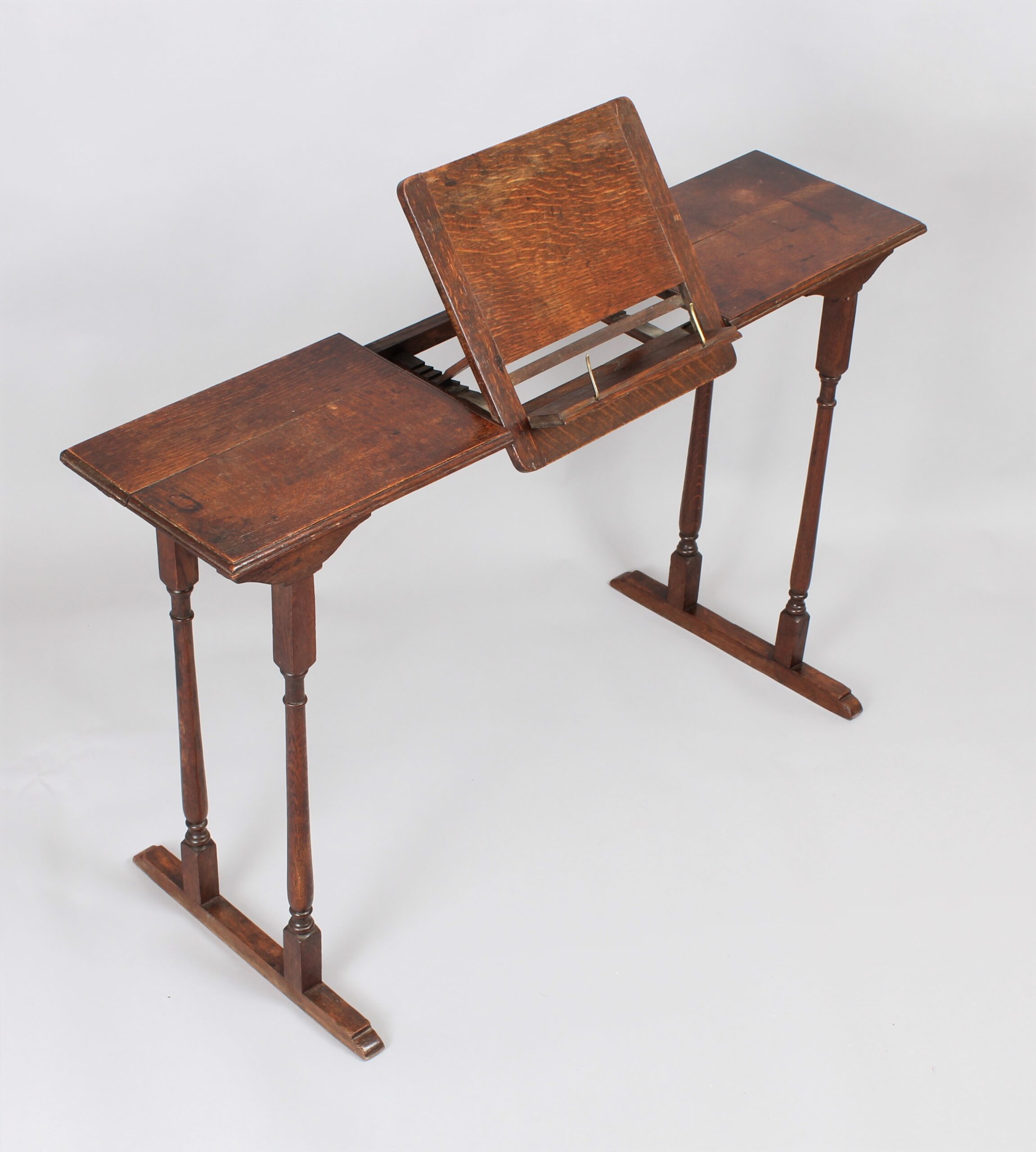 Late 19th early 20th oak reading, artist’s or musician’s table