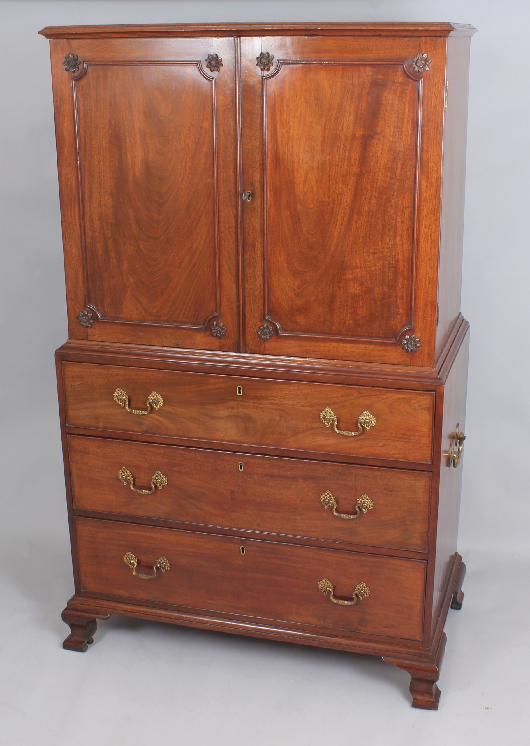A small 18th century mahogany cabinet