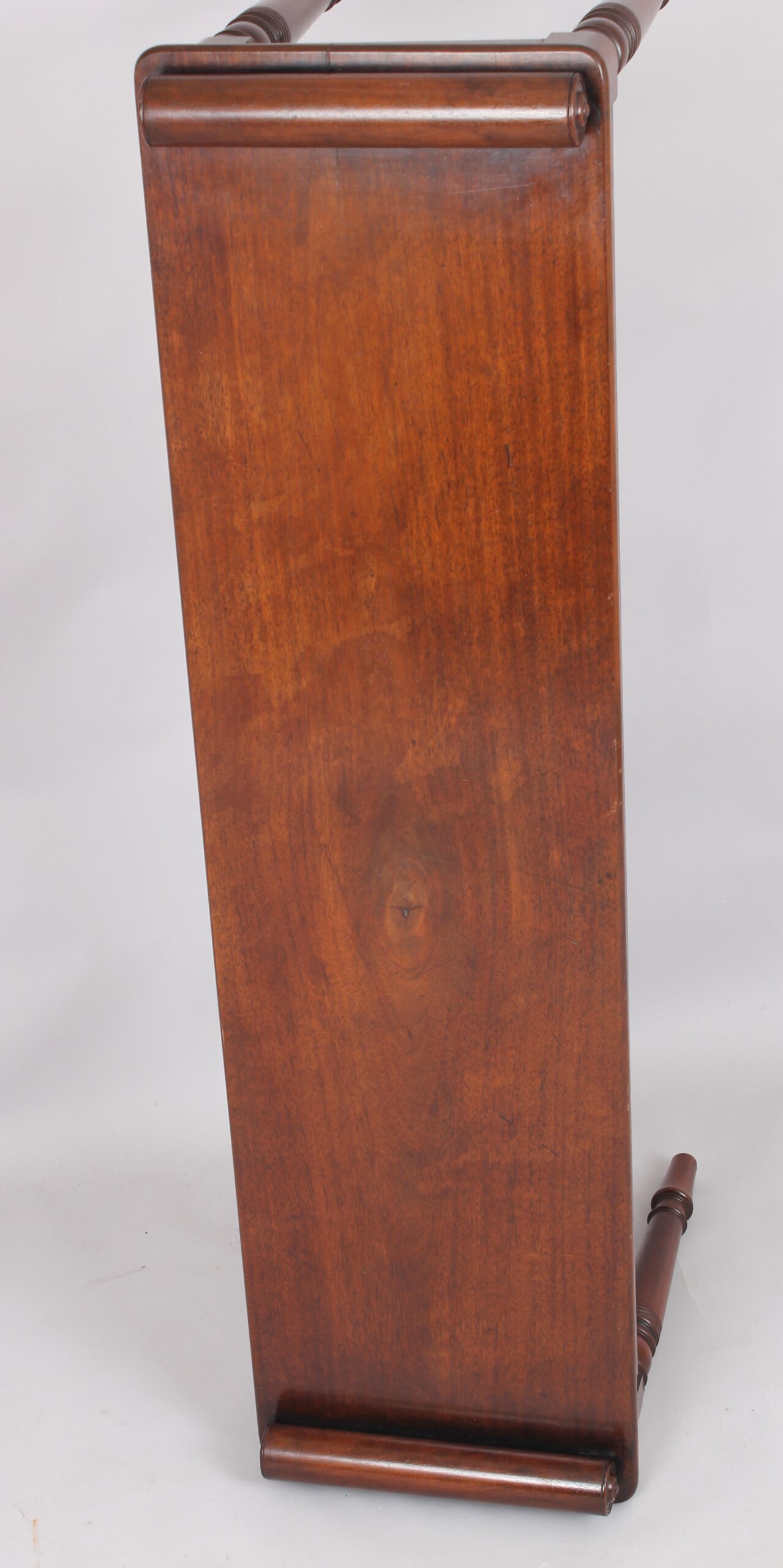 A fine and elegant mahogany hall bench