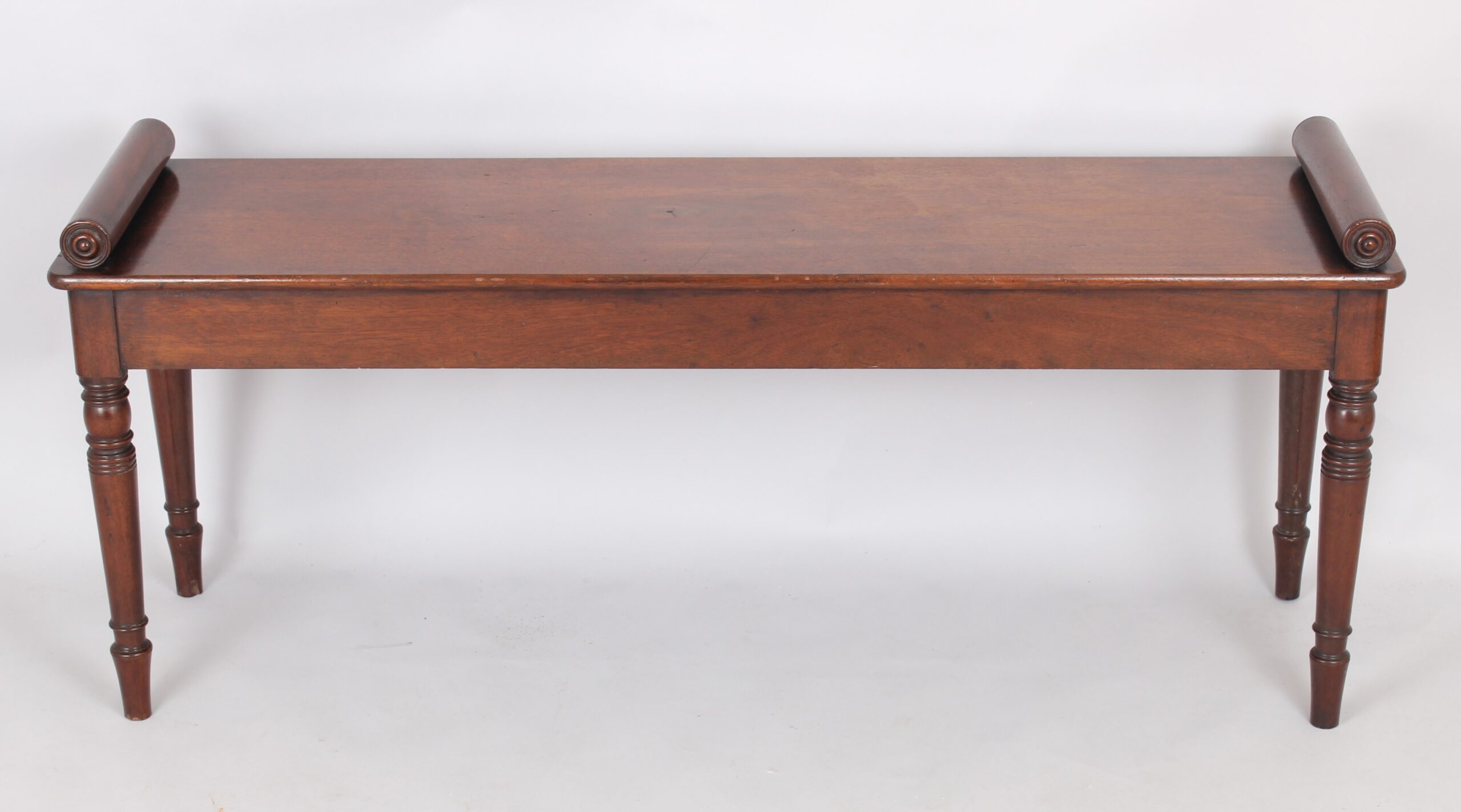 A fine and elegant mahogany hall bench