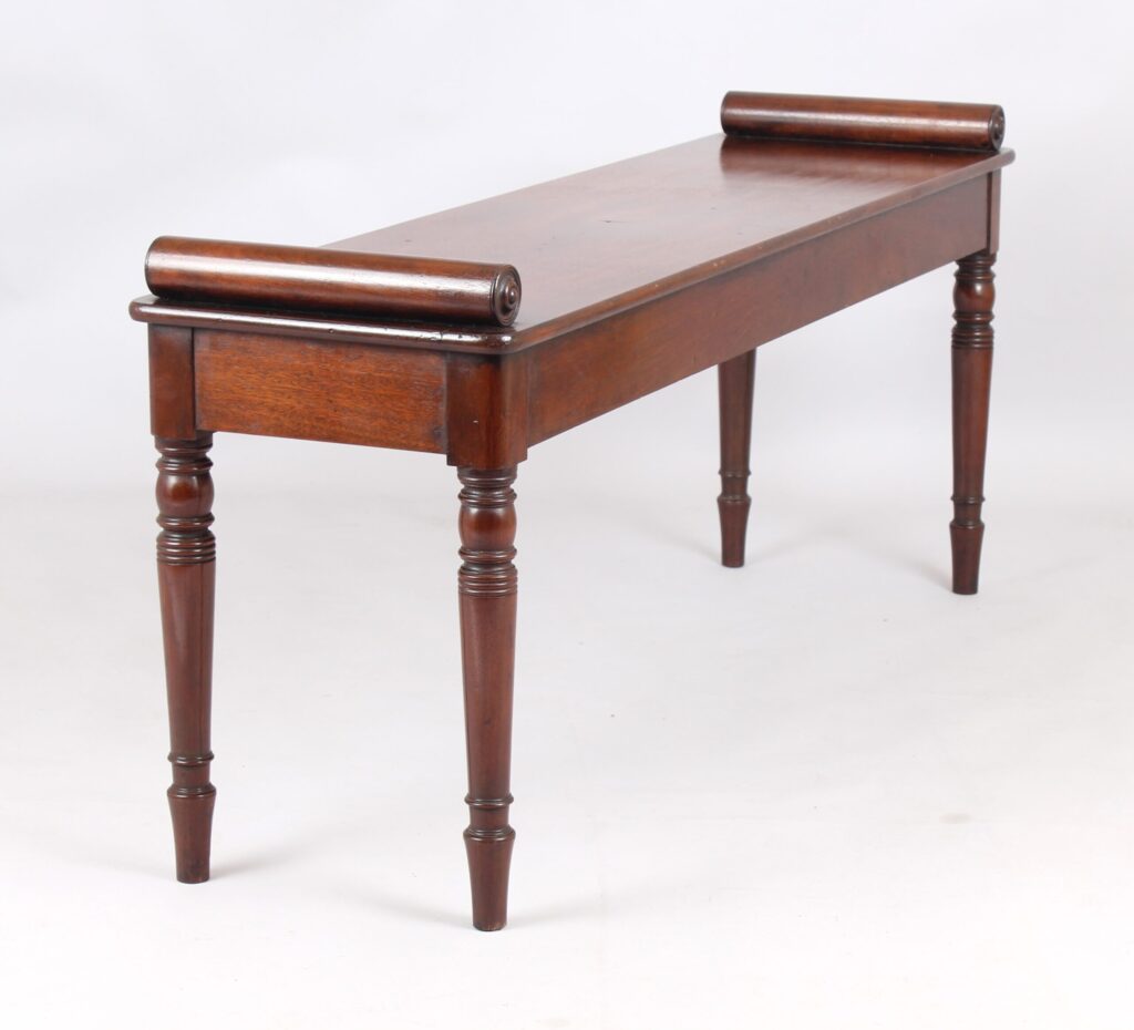 A fine and elegant mahogany hall bench