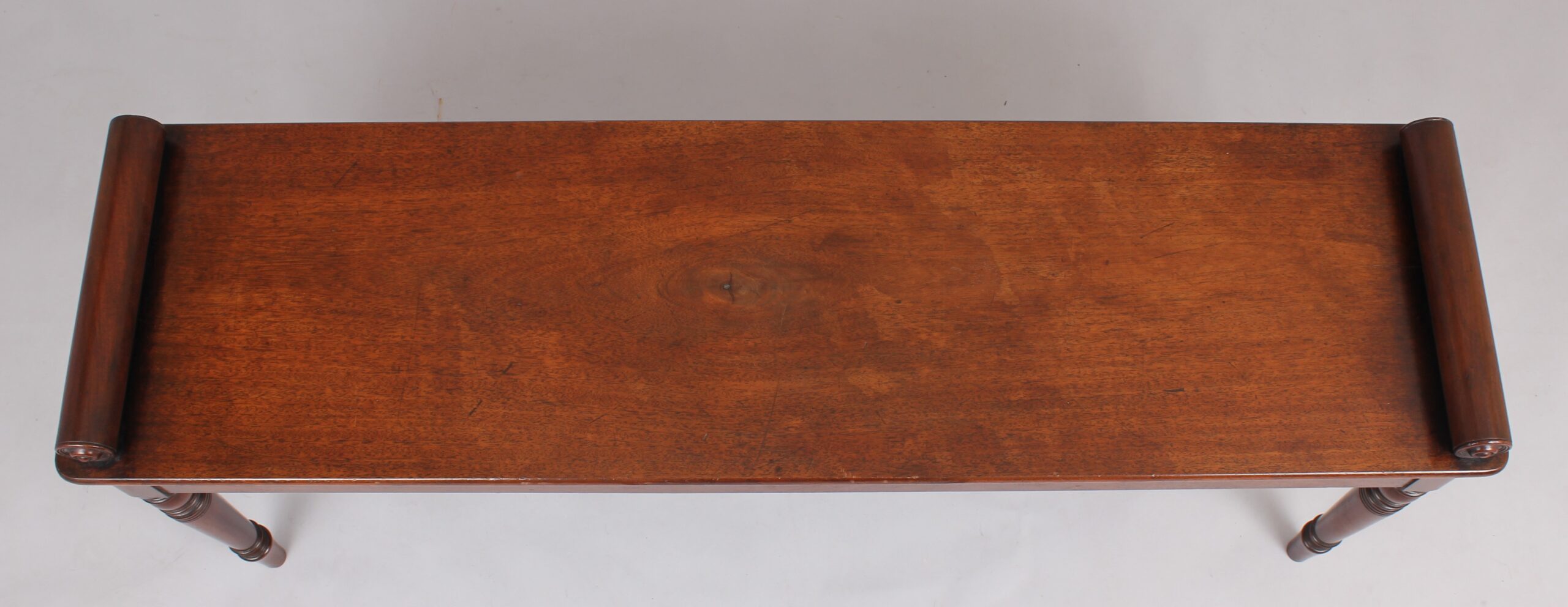 A fine and elegant mahogany hall bench