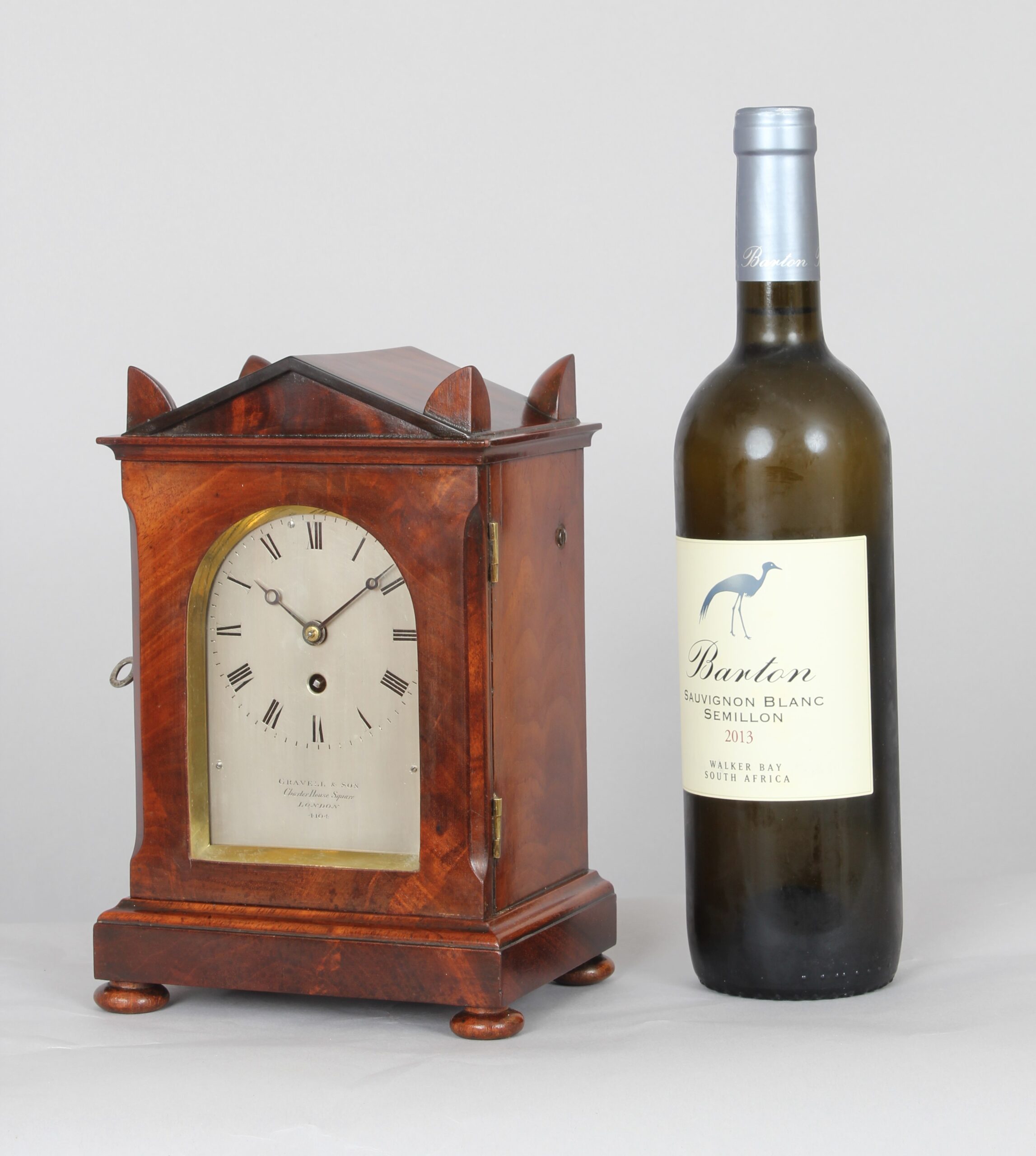 A fine George IV period mahogany mantel / library clock