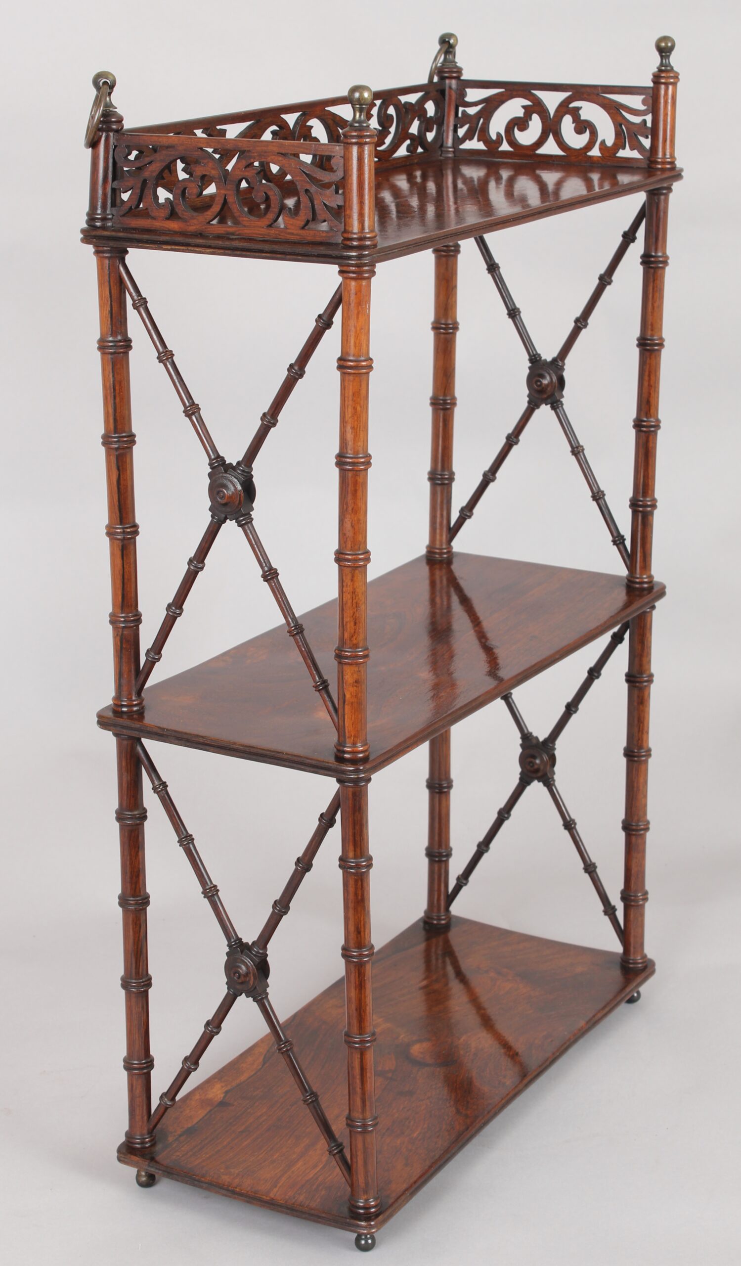 Rare and fine quality Regency period small rosewood hanging shelves