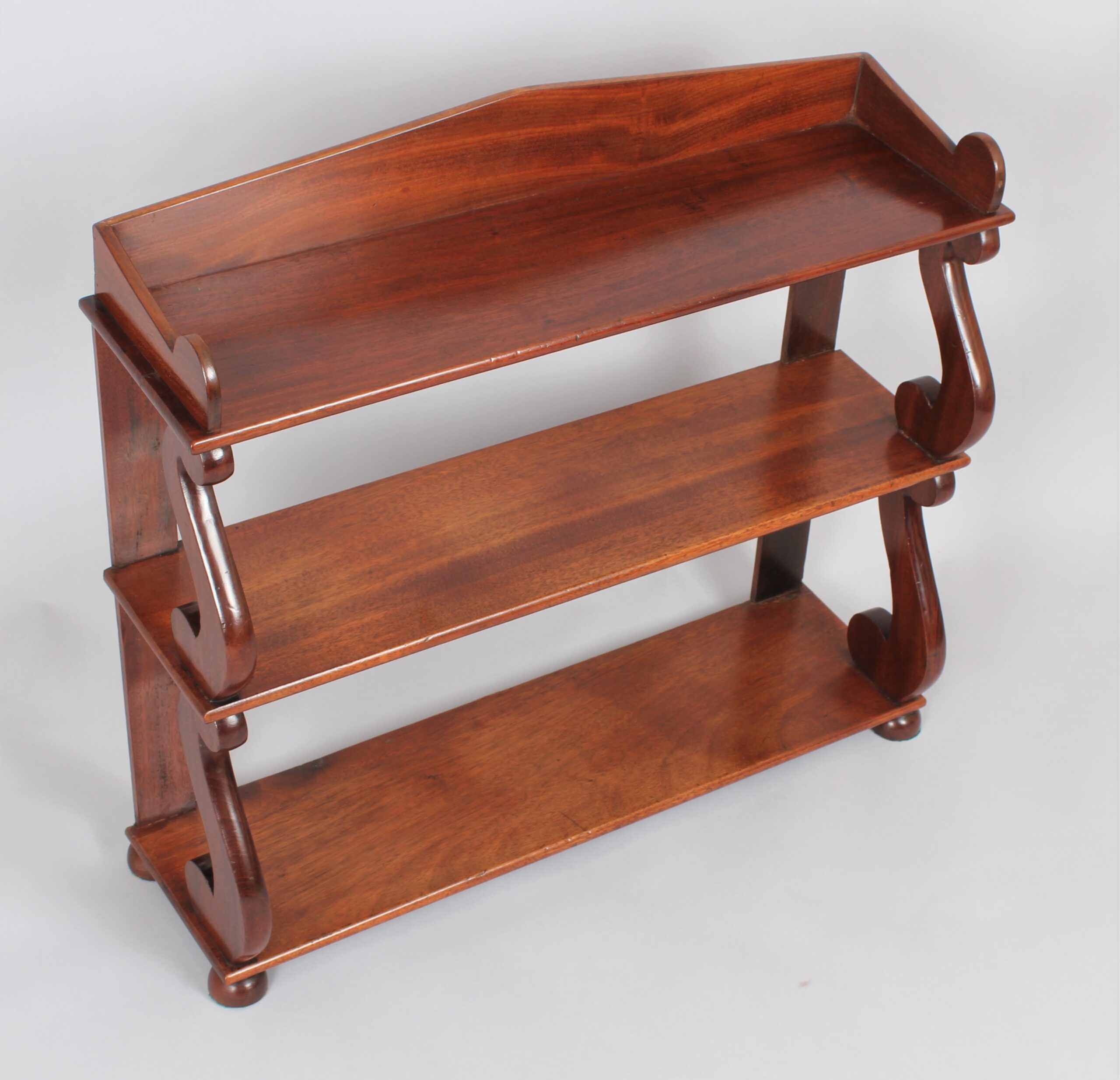 Regency set of mahogany hanging shelves