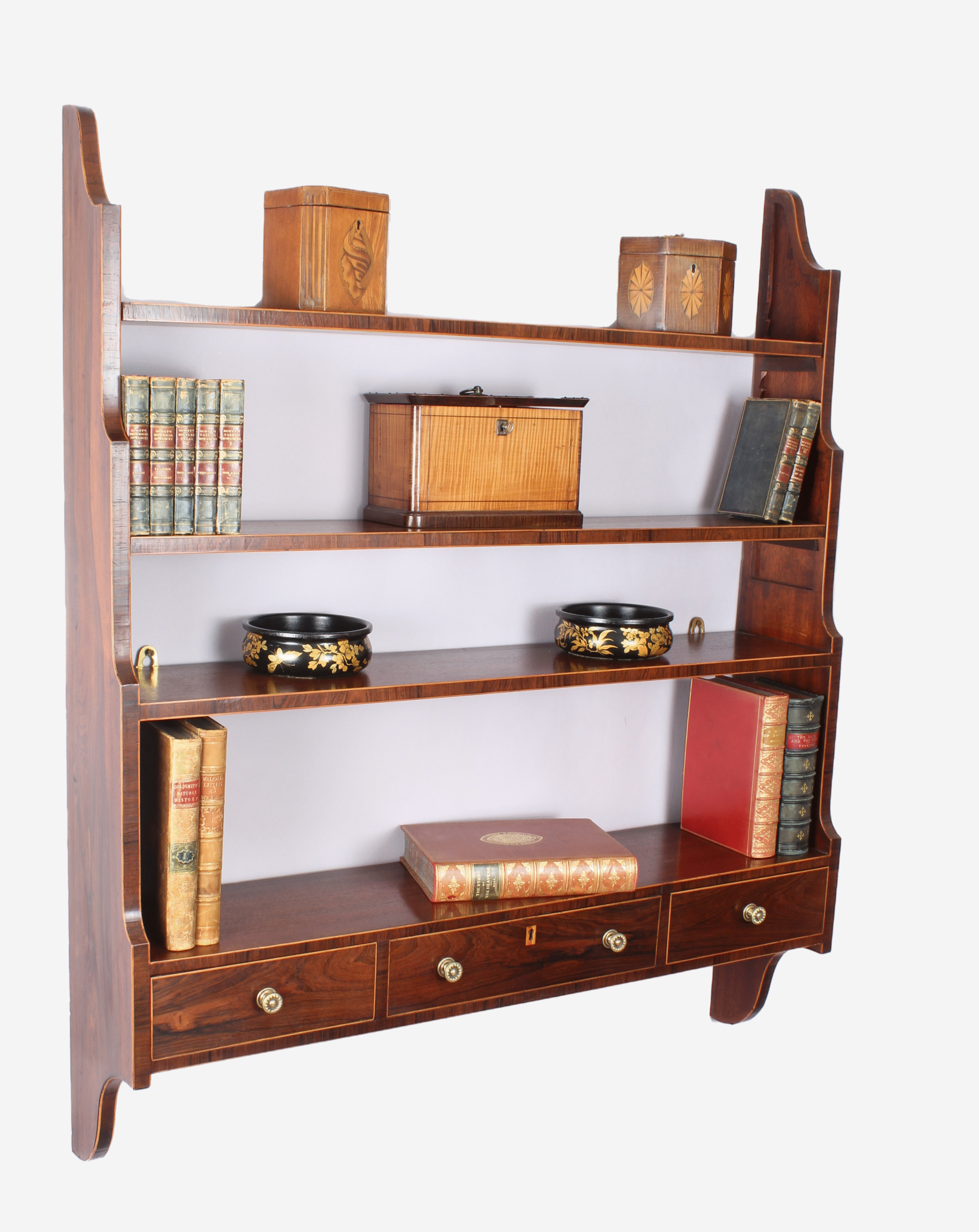 Unusual George III period mahogany hanging shelves
