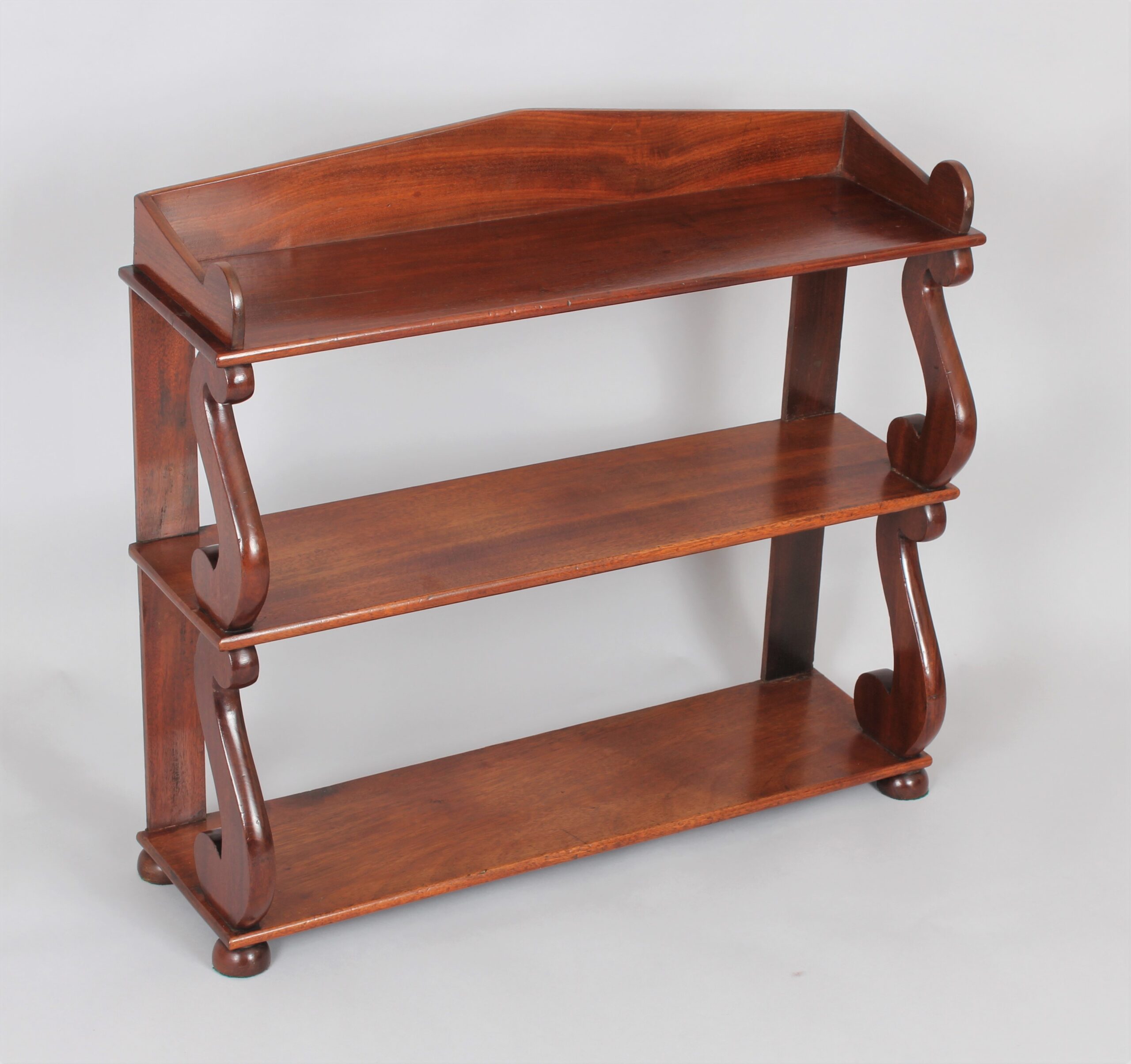 Regency set of mahogany hanging shelves