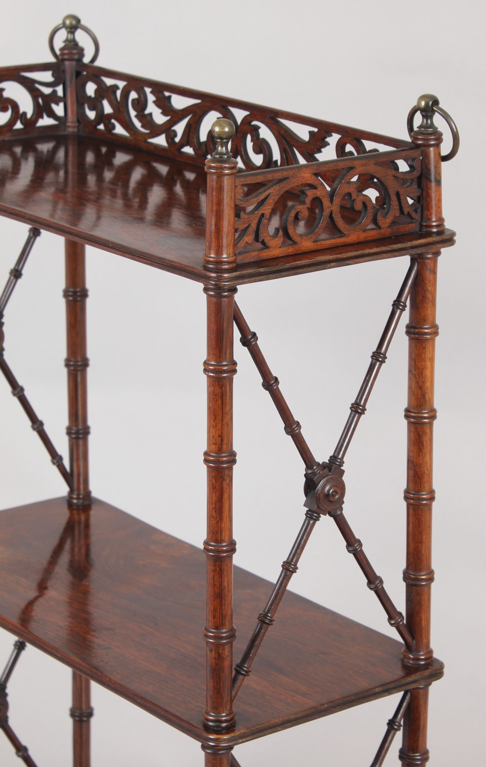 Rare and fine quality Regency period small rosewood hanging shelves