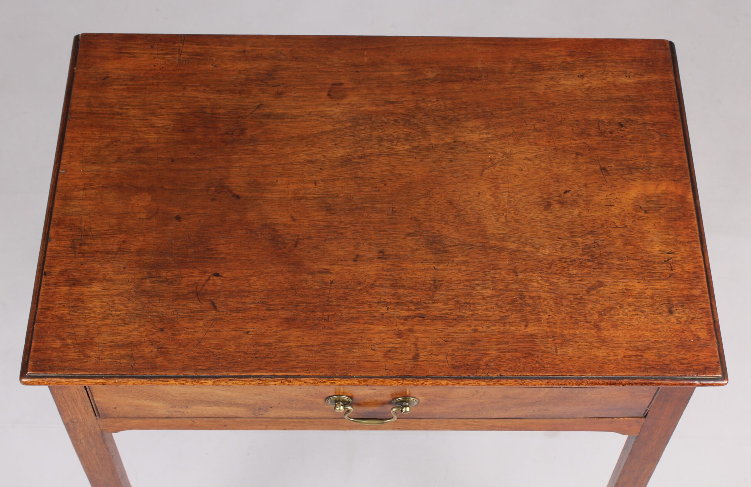 A George III mahogany single drawer side table