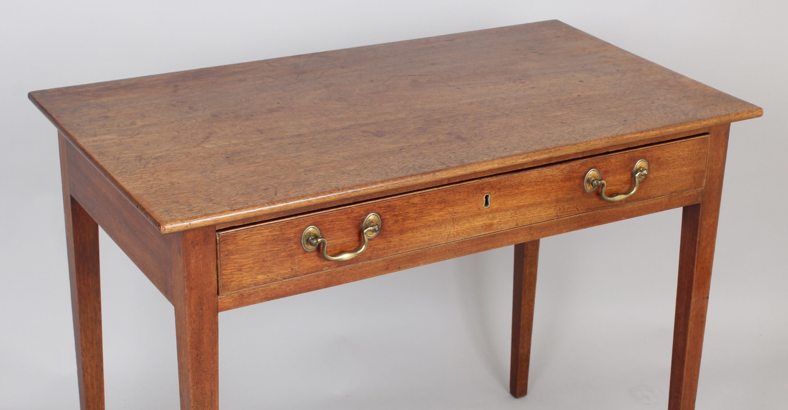 A George III period pale mahogany side-table