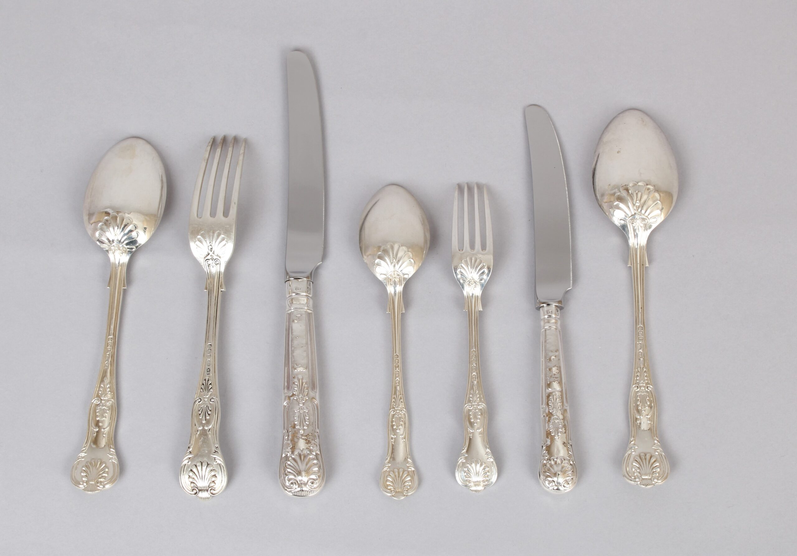 A very fine and substantial Edwardian Kings Honeysuckle pattern cutlery service for 24 people by Joseph Rodgers and Sons, Sheffield 1902