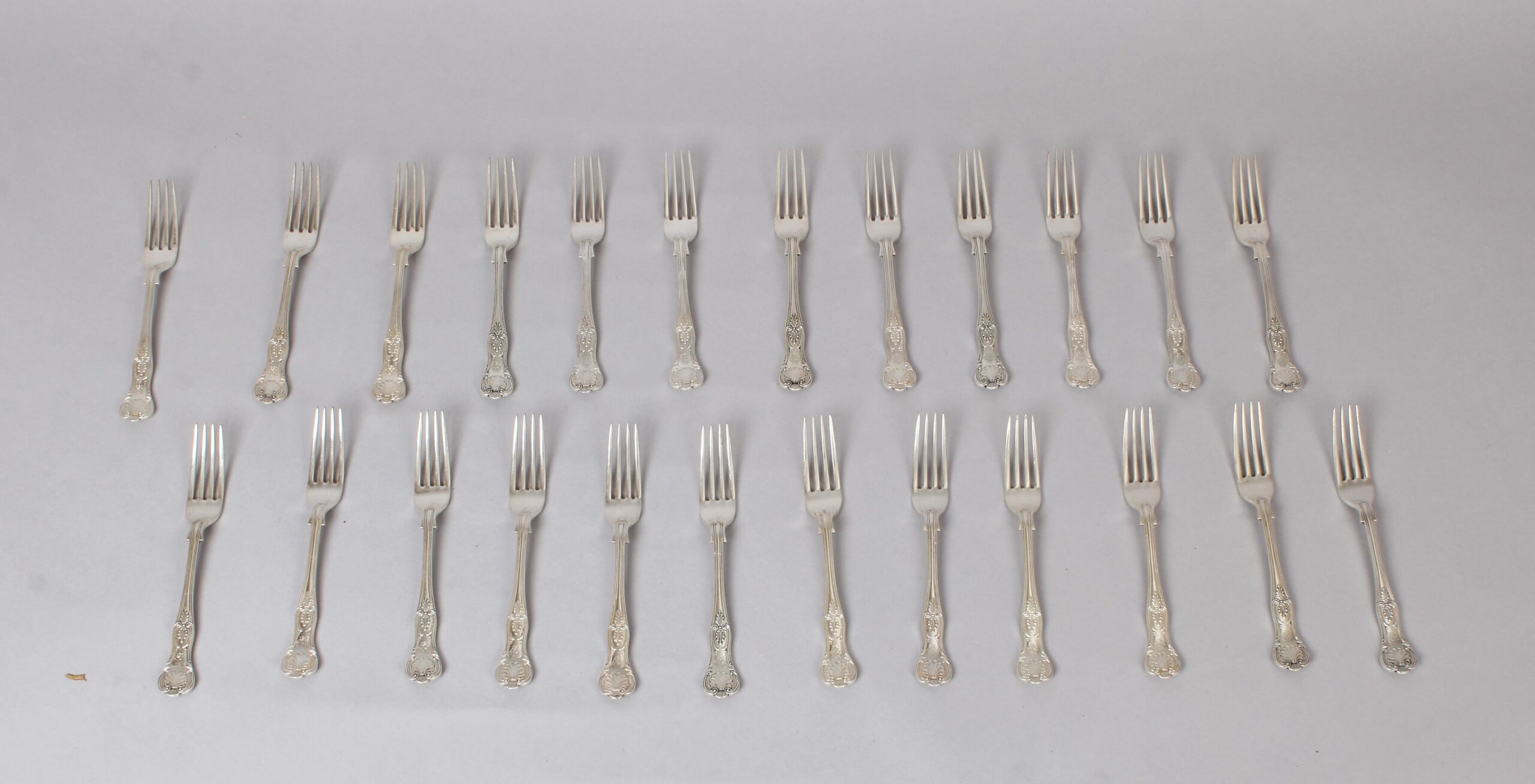 A very fine and substantial Edwardian Kings Honeysuckle pattern cutlery service for 24 people by Joseph Rodgers and Sons, Sheffield 1902