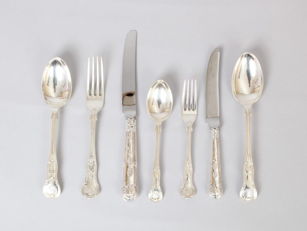 A very fine and substantial Edwardian Kings Honeysuckle pattern cutlery service for 24 people by Joseph Rodgers and Sons, Sheffield 1902