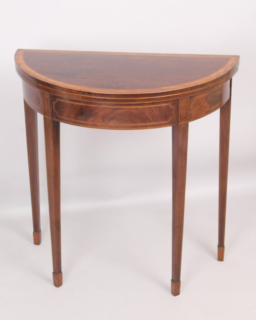 Mahogany half round card table of rare small size