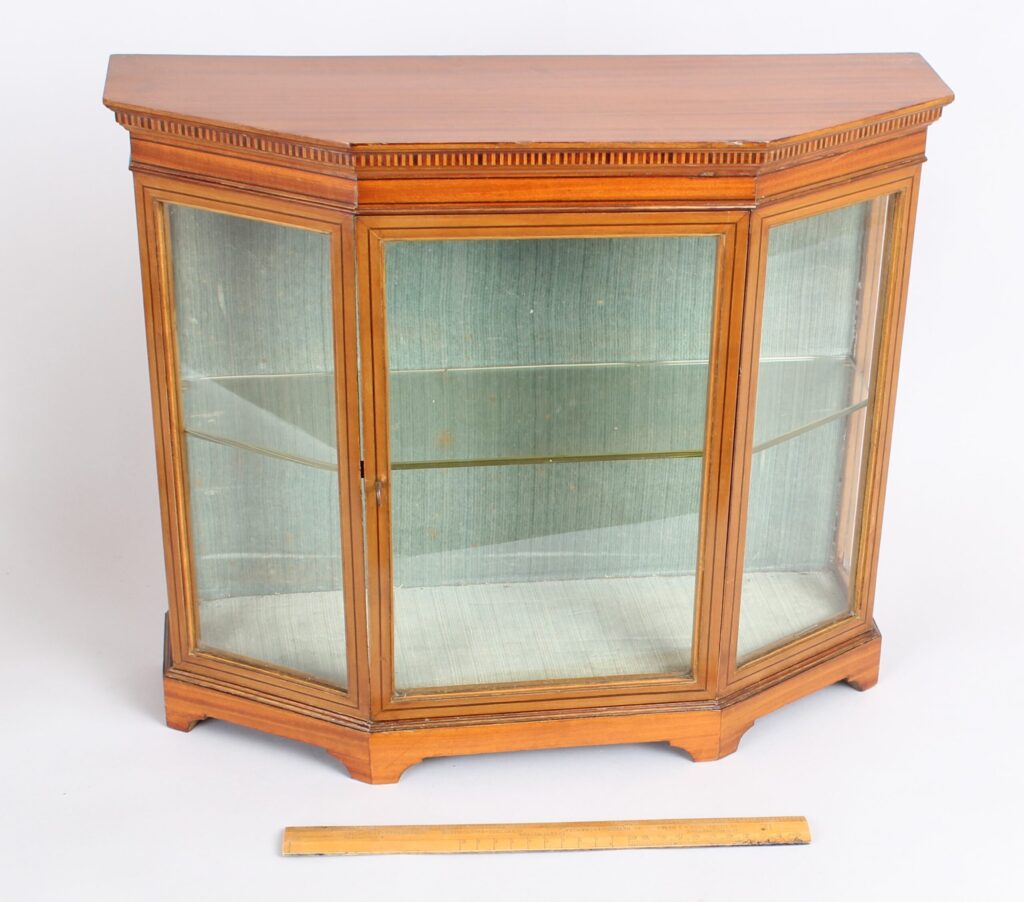 An Edwardian satinwood miniature glazed display cabinet