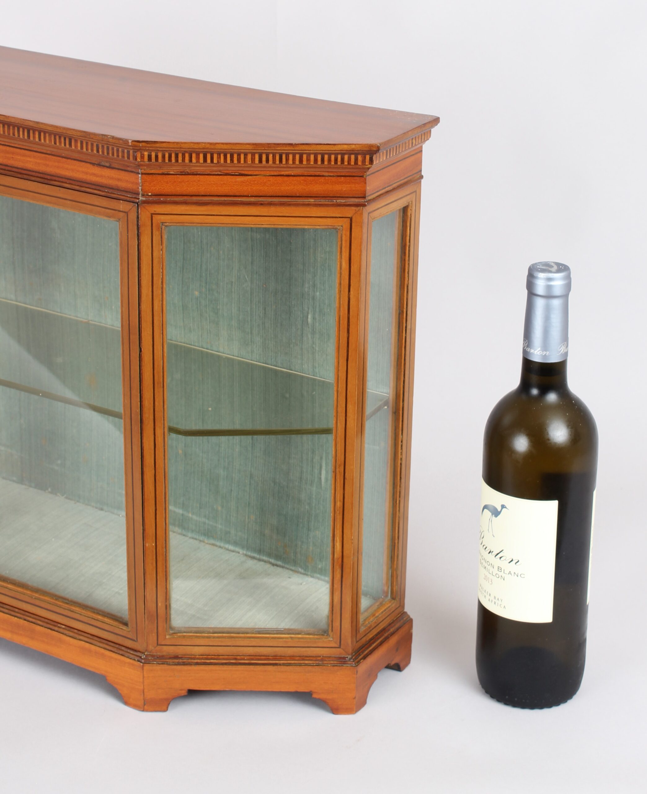An Edwardian satinwood miniature glazed display cabinet