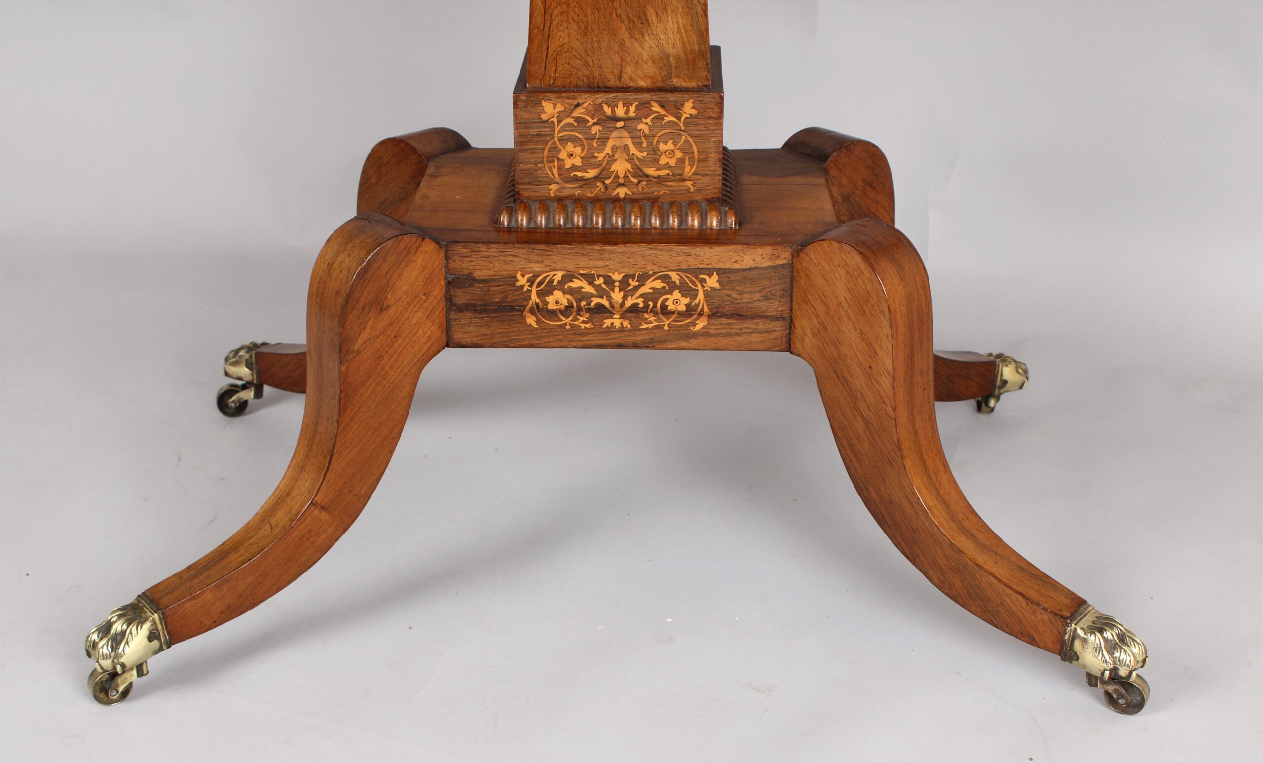 A fine Regency period sofa table of unusually small proportions