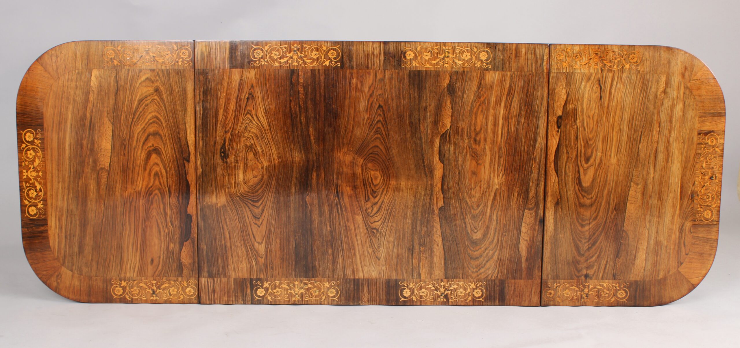 A fine Regency period sofa table of unusually small proportions