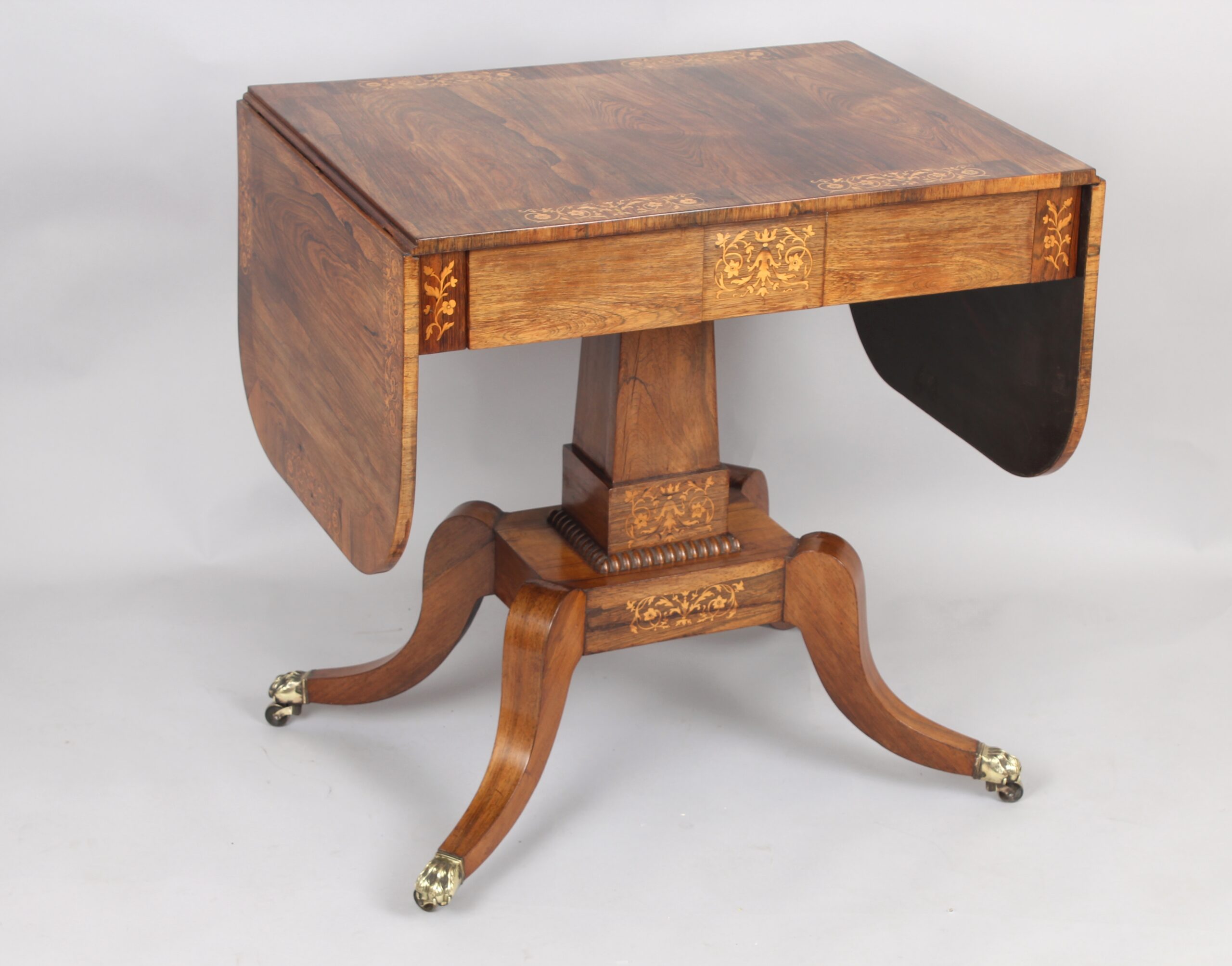 A fine Regency period sofa table of unusually small proportions