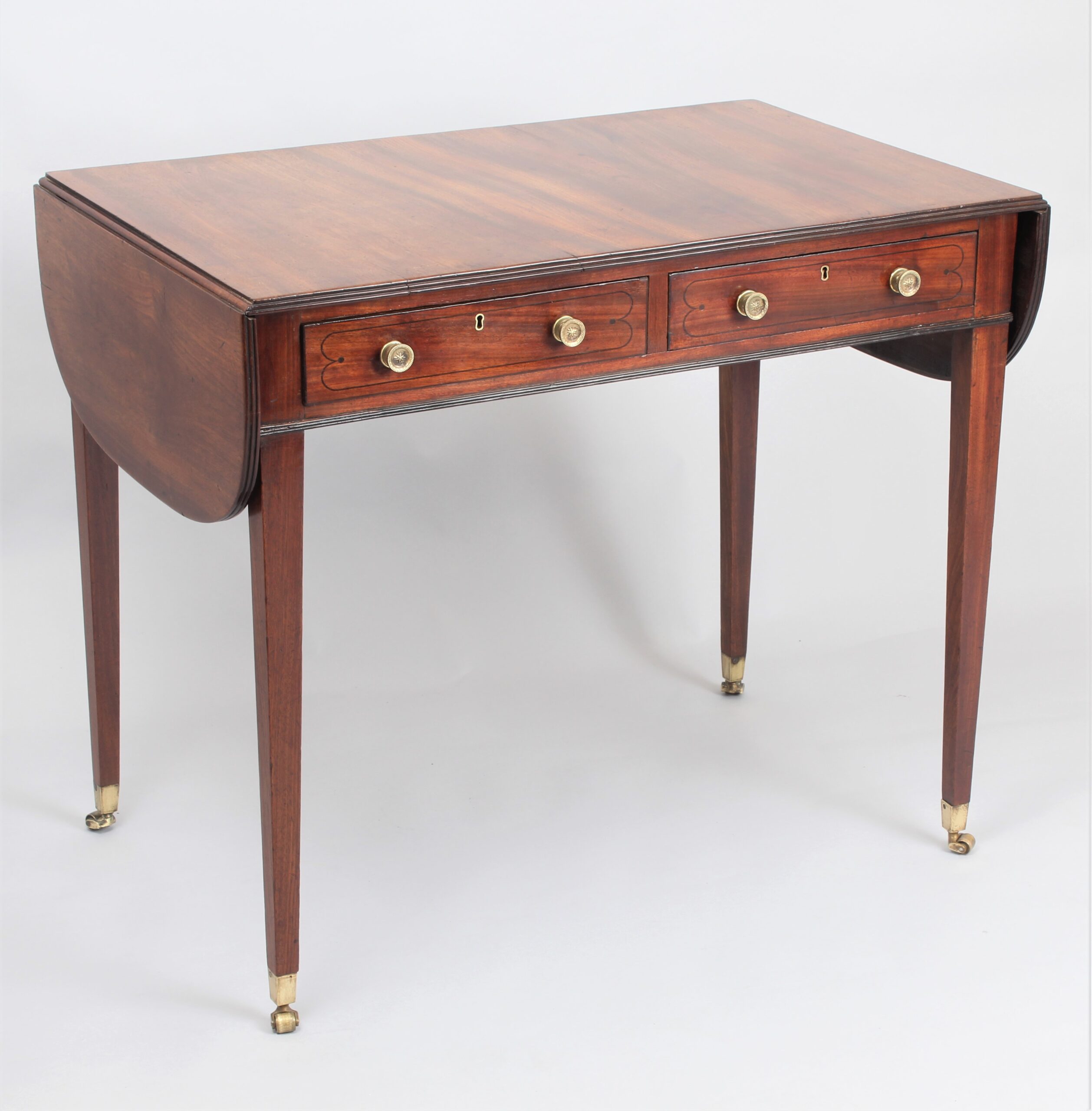 Particularly fine George III period mahogany sofa table