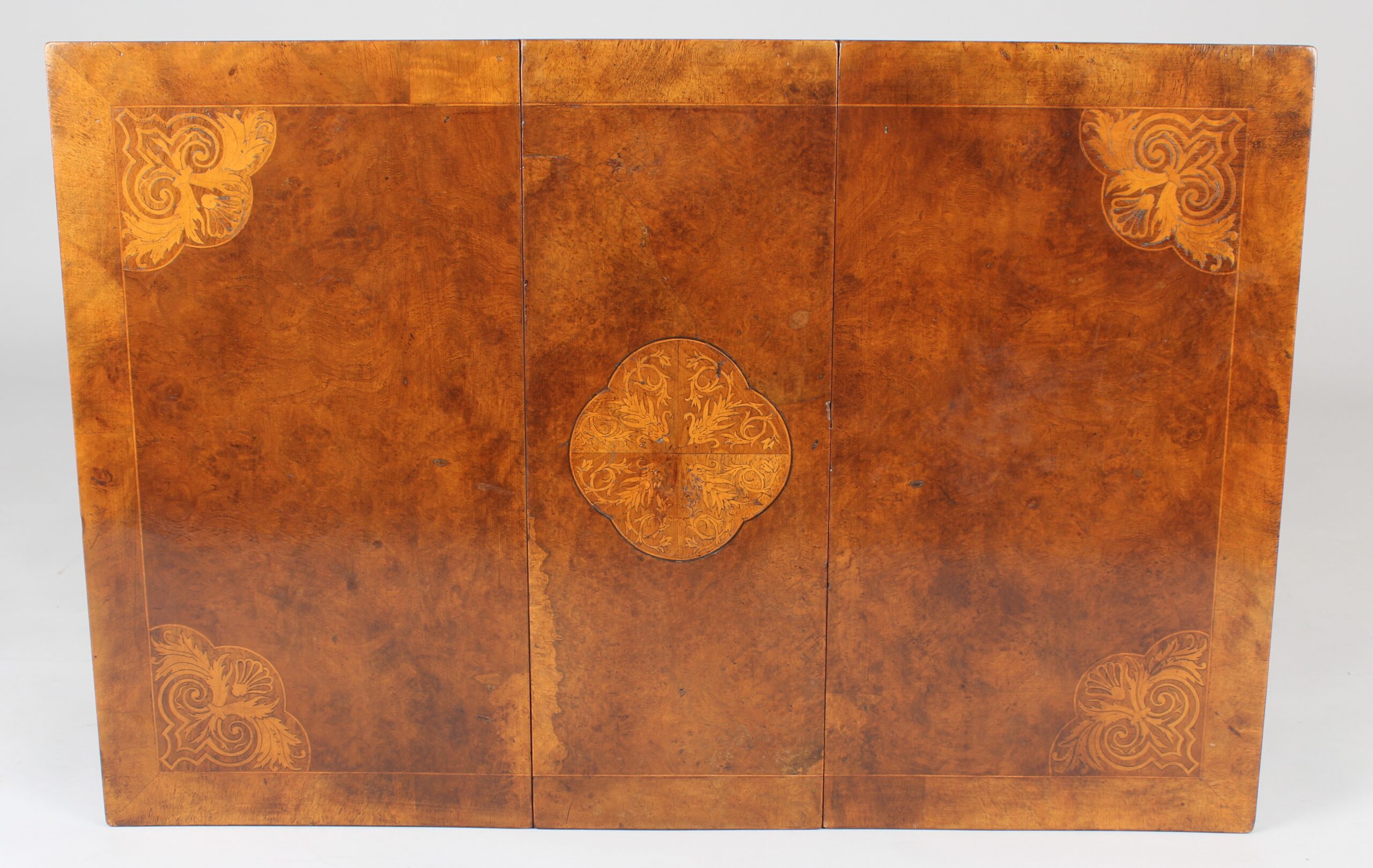 Edwardian burr walnut and parquetry Sutherland table of rare form