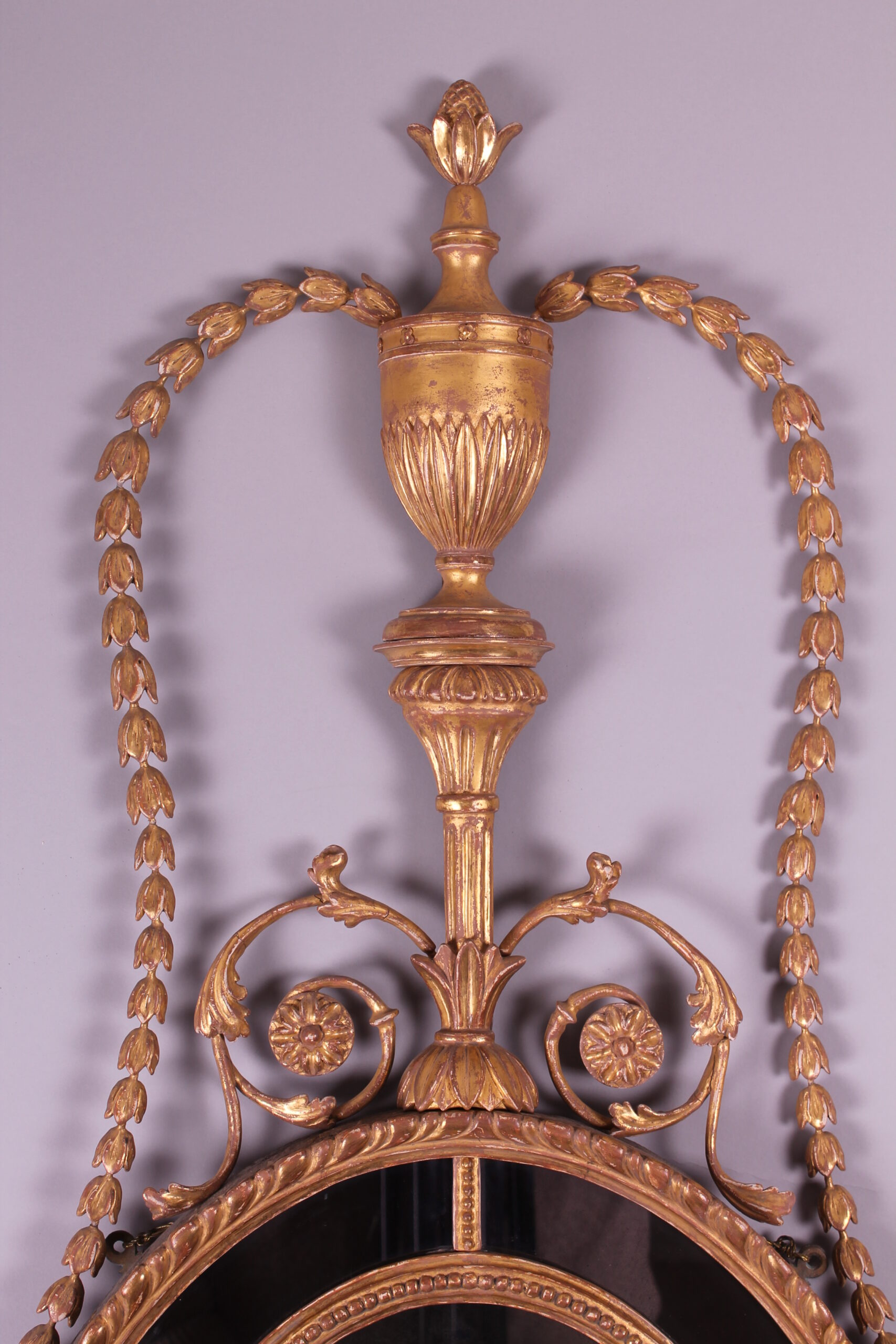 A George III period carved and gilt wood mirror