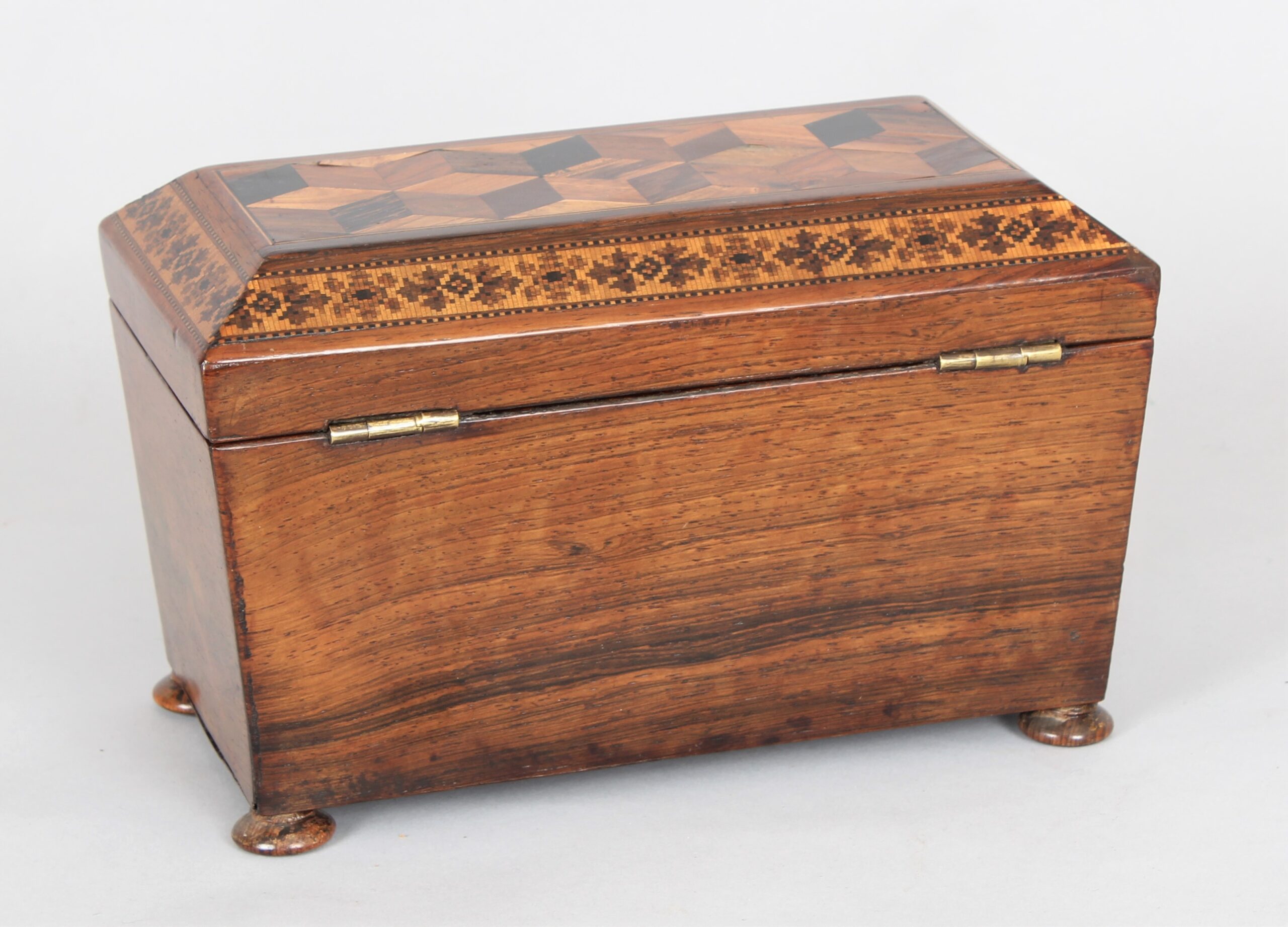 Rosewood tea caddy of sarcophagus form