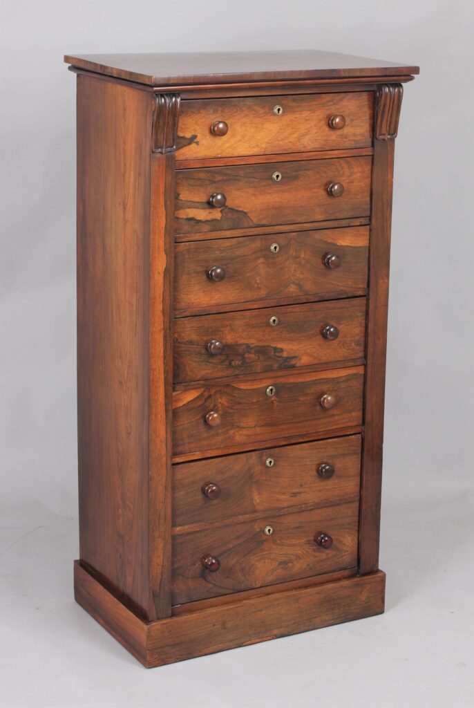 A rosewood Wellington chest