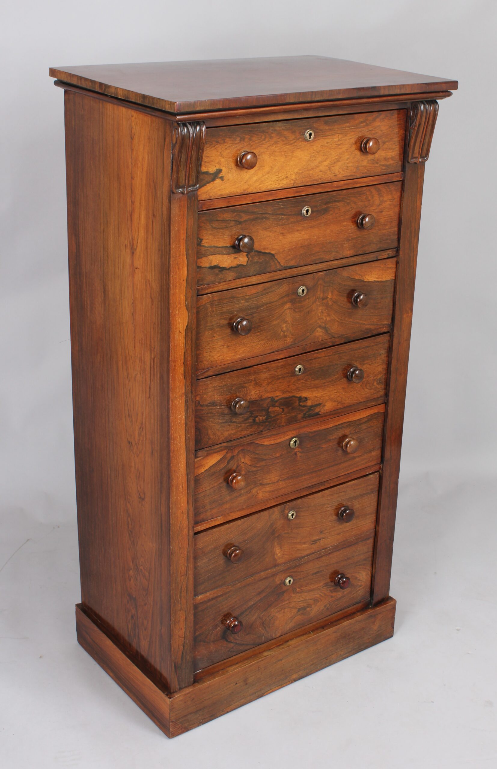 A rosewood Wellington chest