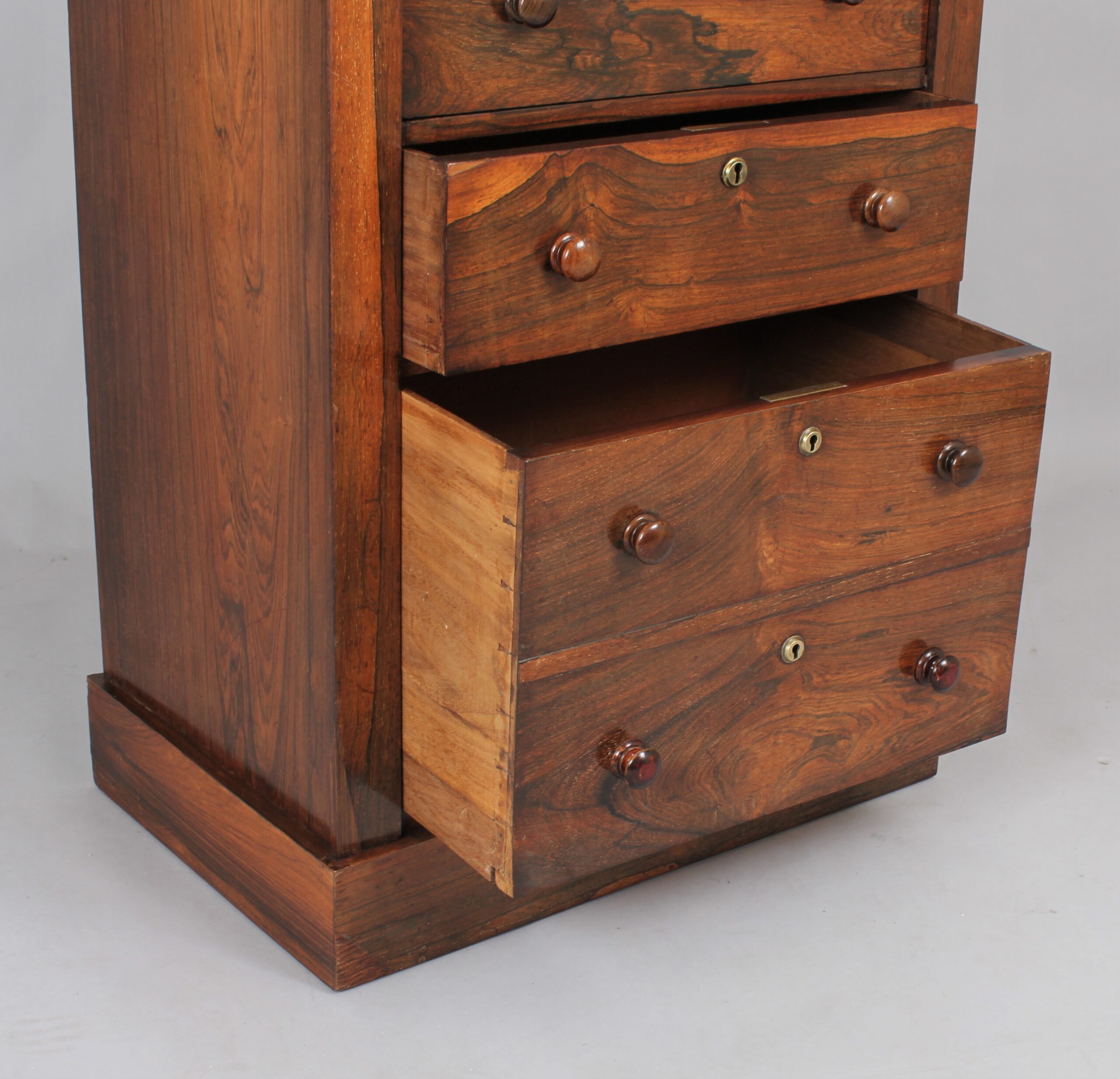 A rosewood Wellington chest