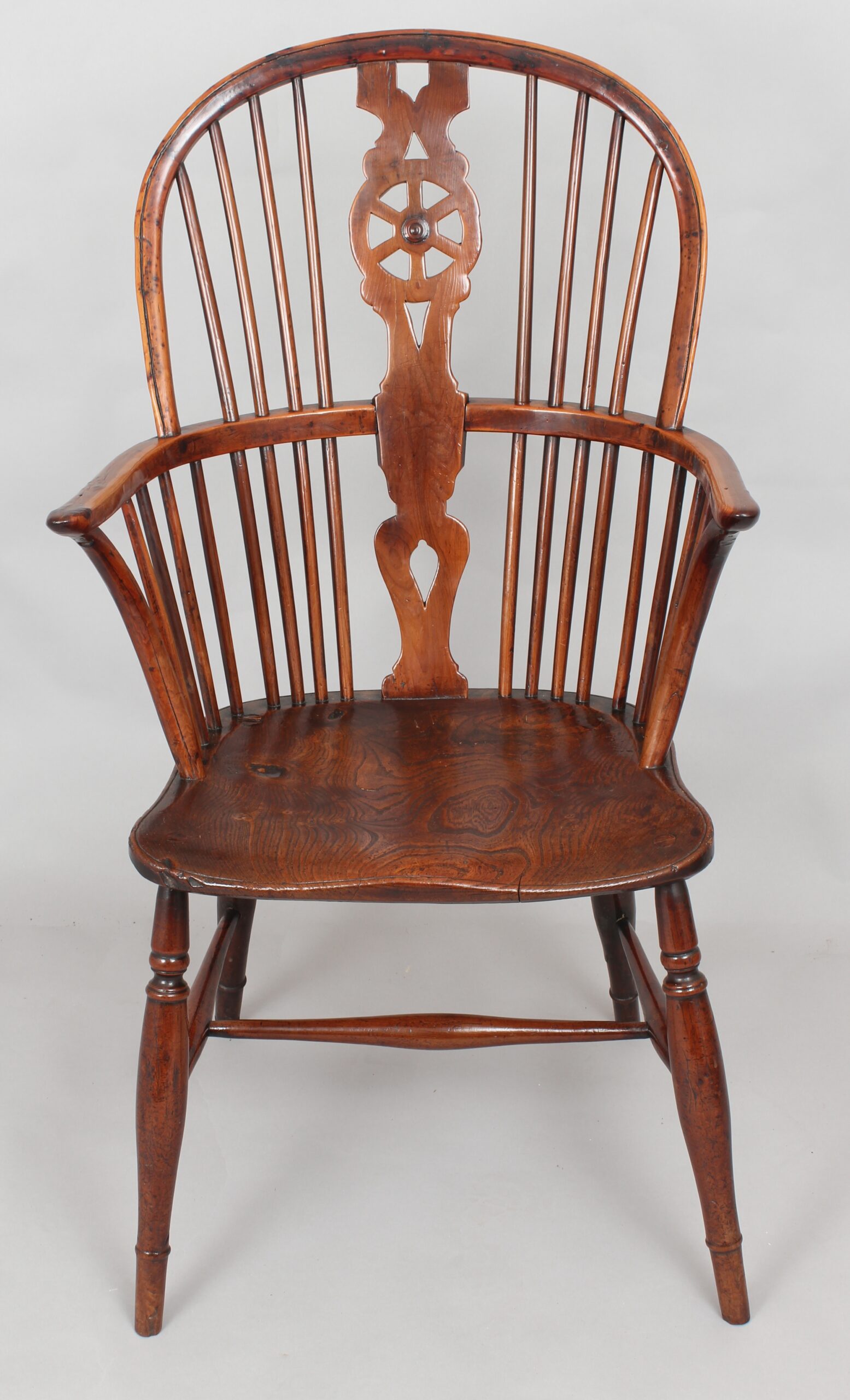 Early nineteenth century yew and elm Windsor arm-chair