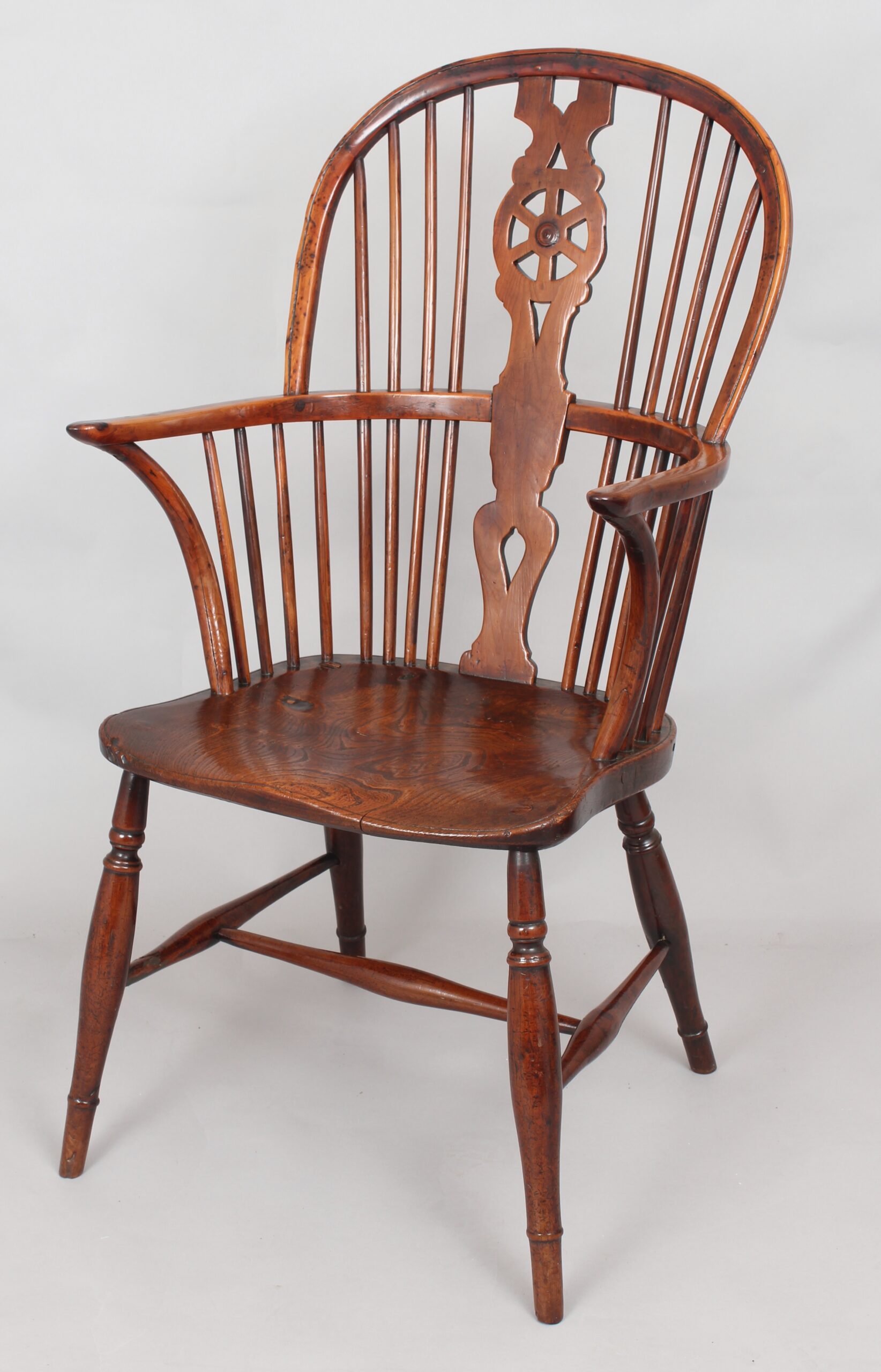 Early nineteenth century yew and elm Windsor arm-chair
