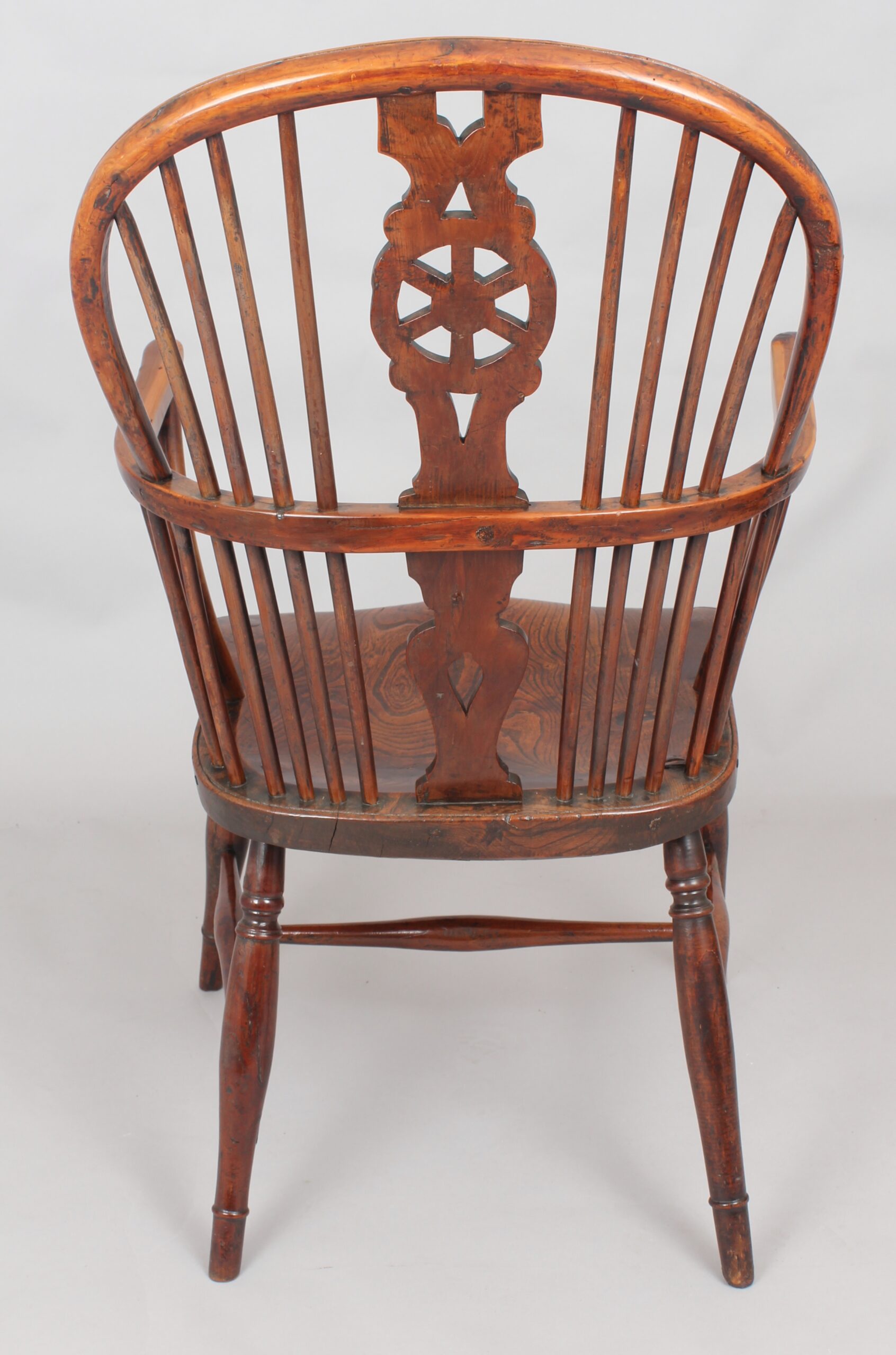 Early nineteenth century yew and elm Windsor arm-chair