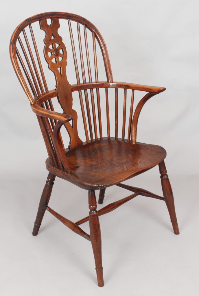 Early nineteenth century yew and elm Windsor arm-chair