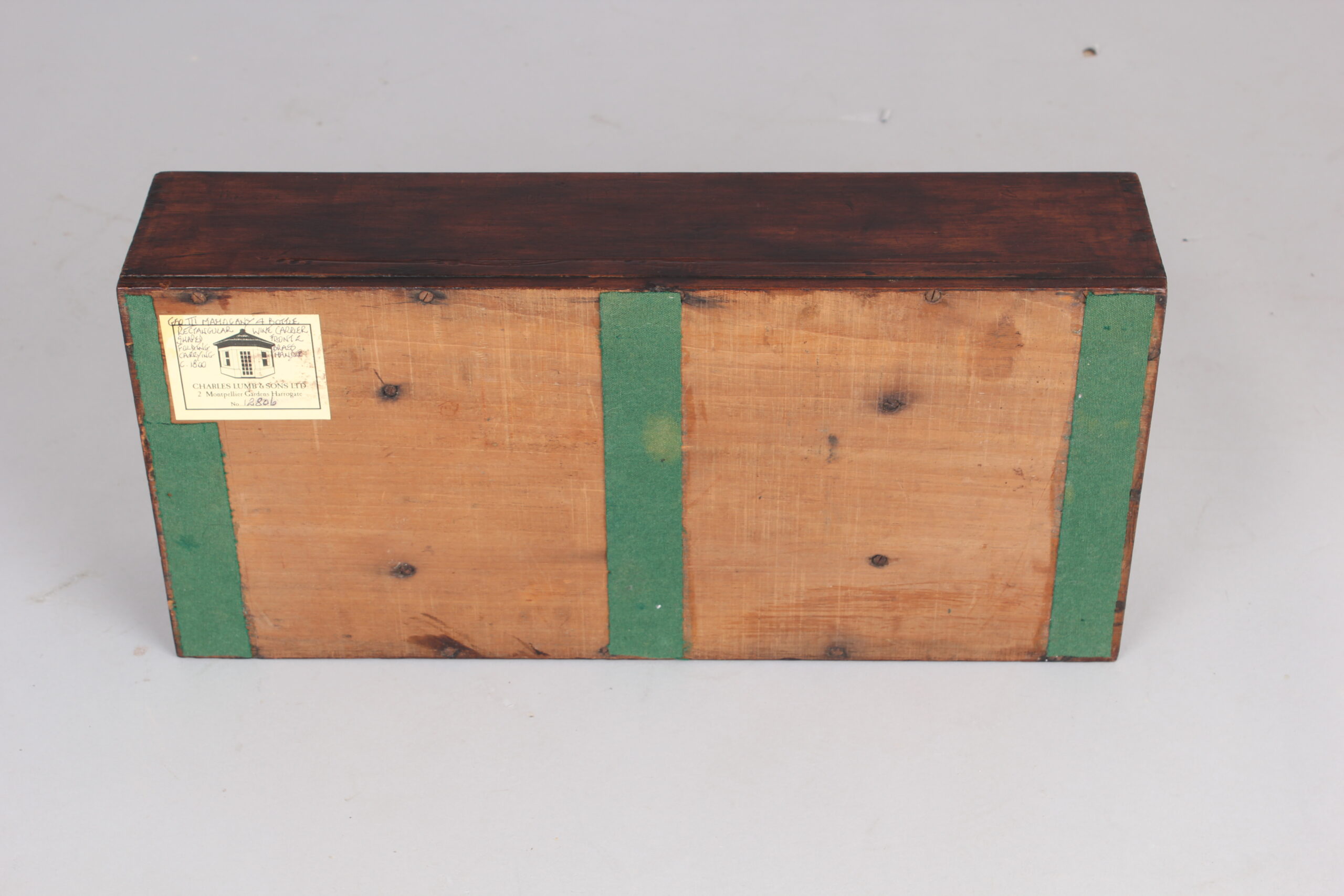 George III mahogany four bottle rectangular wine carrier