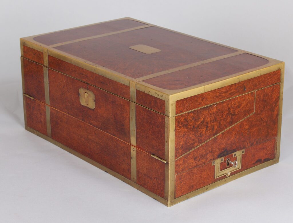 An important mid 19th century French brass mounted amboyna writing box