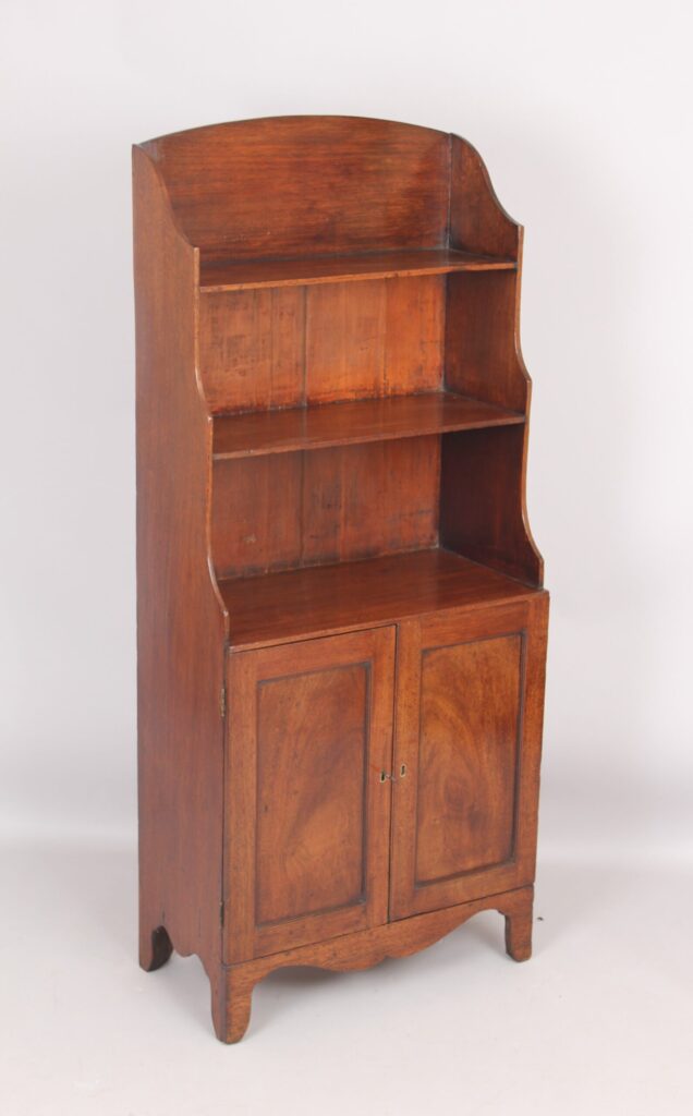 Small mahogany cupboard based waterfall open bookshelves