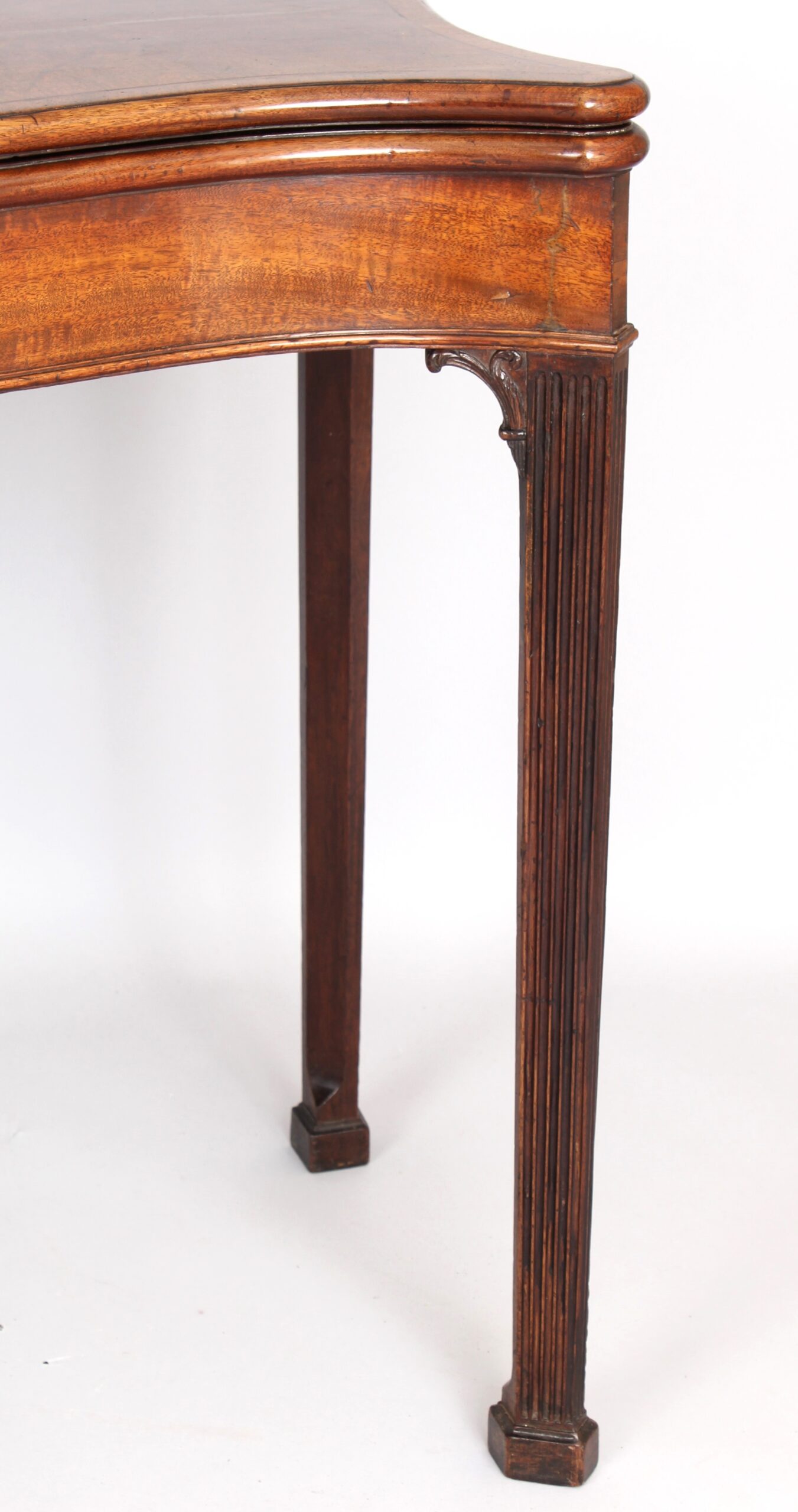 Mahogany serpentine card table