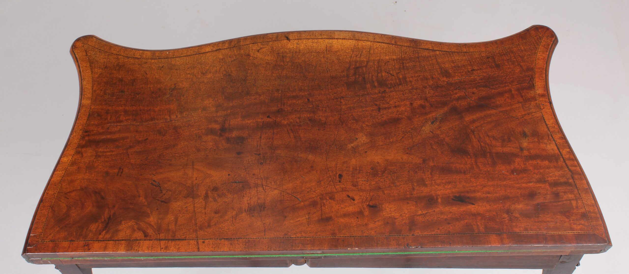 Mahogany serpentine card table