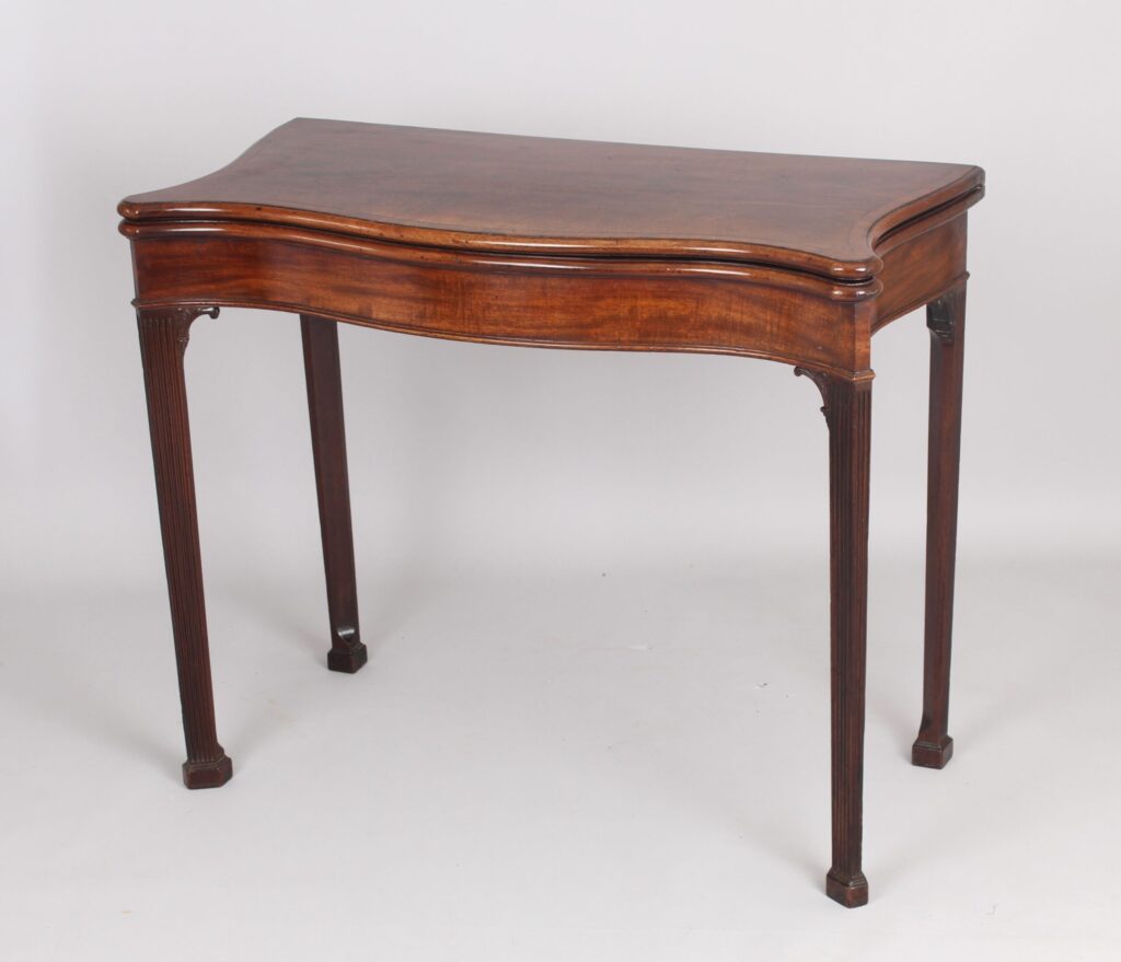 Mahogany serpentine card table