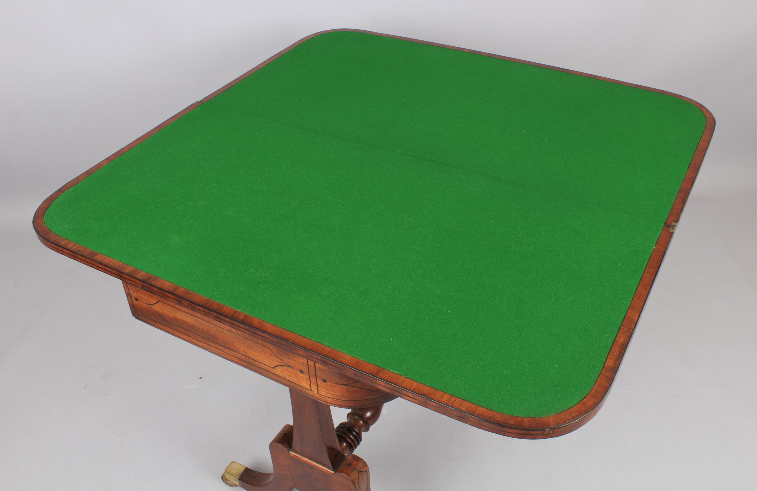 A Regency period mahogany card table