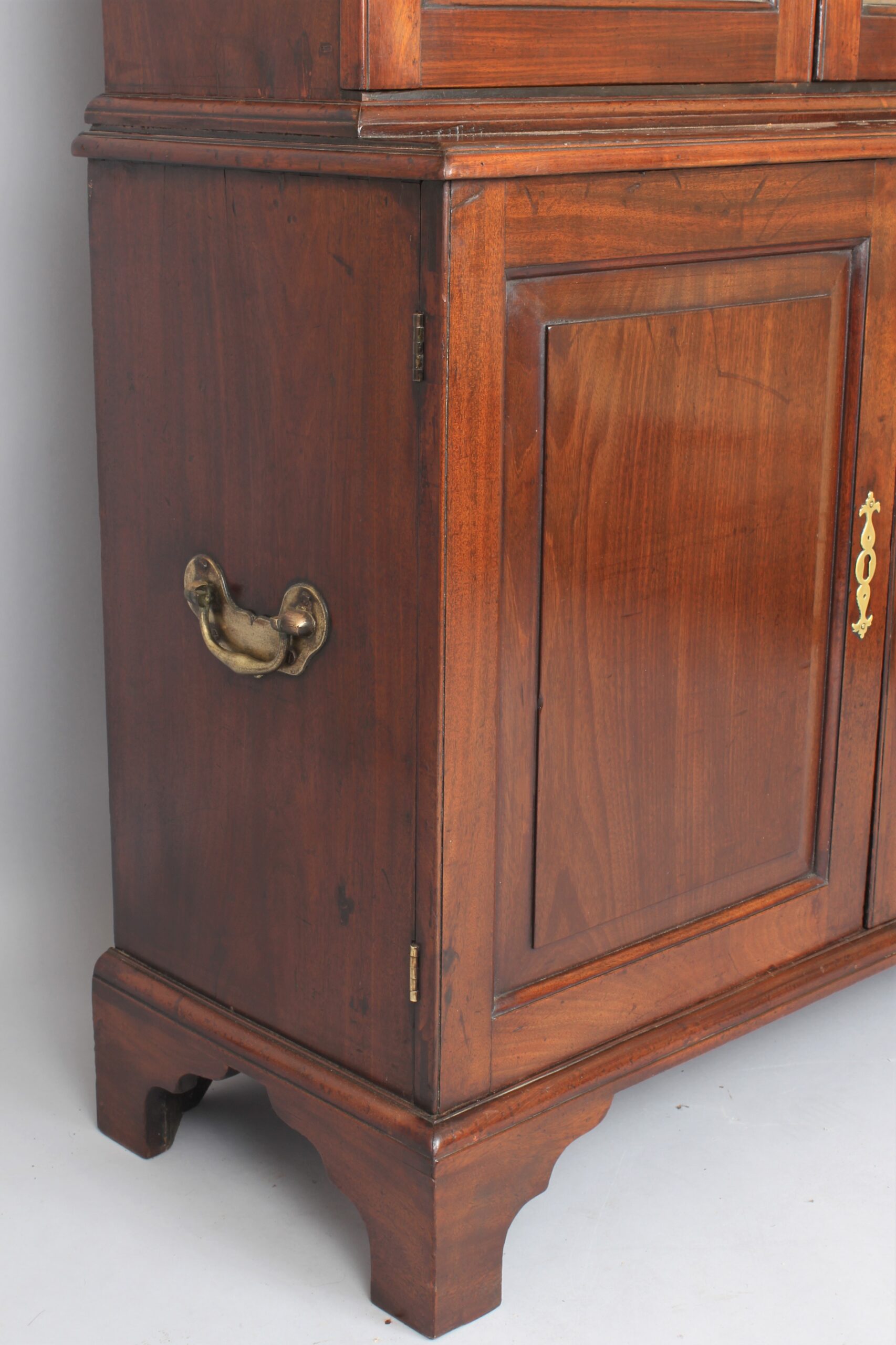 George II ‘red walnut’ cupboard based bookcase