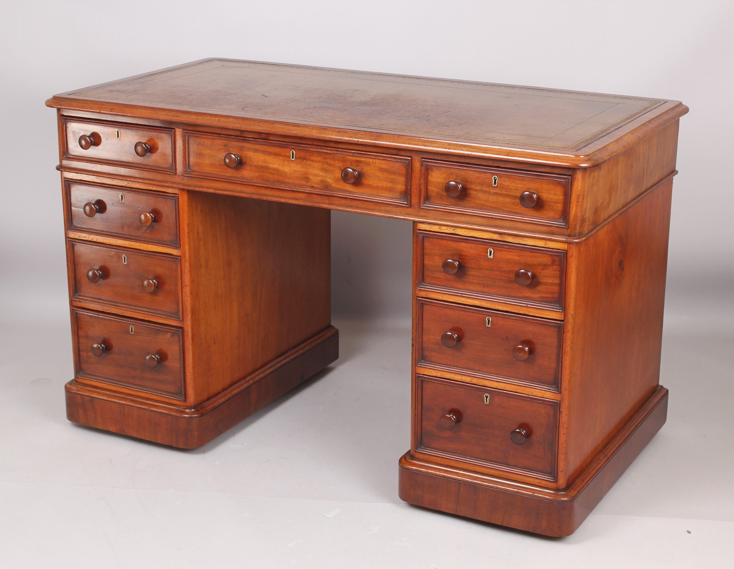 Mahogany three part pedestal desk